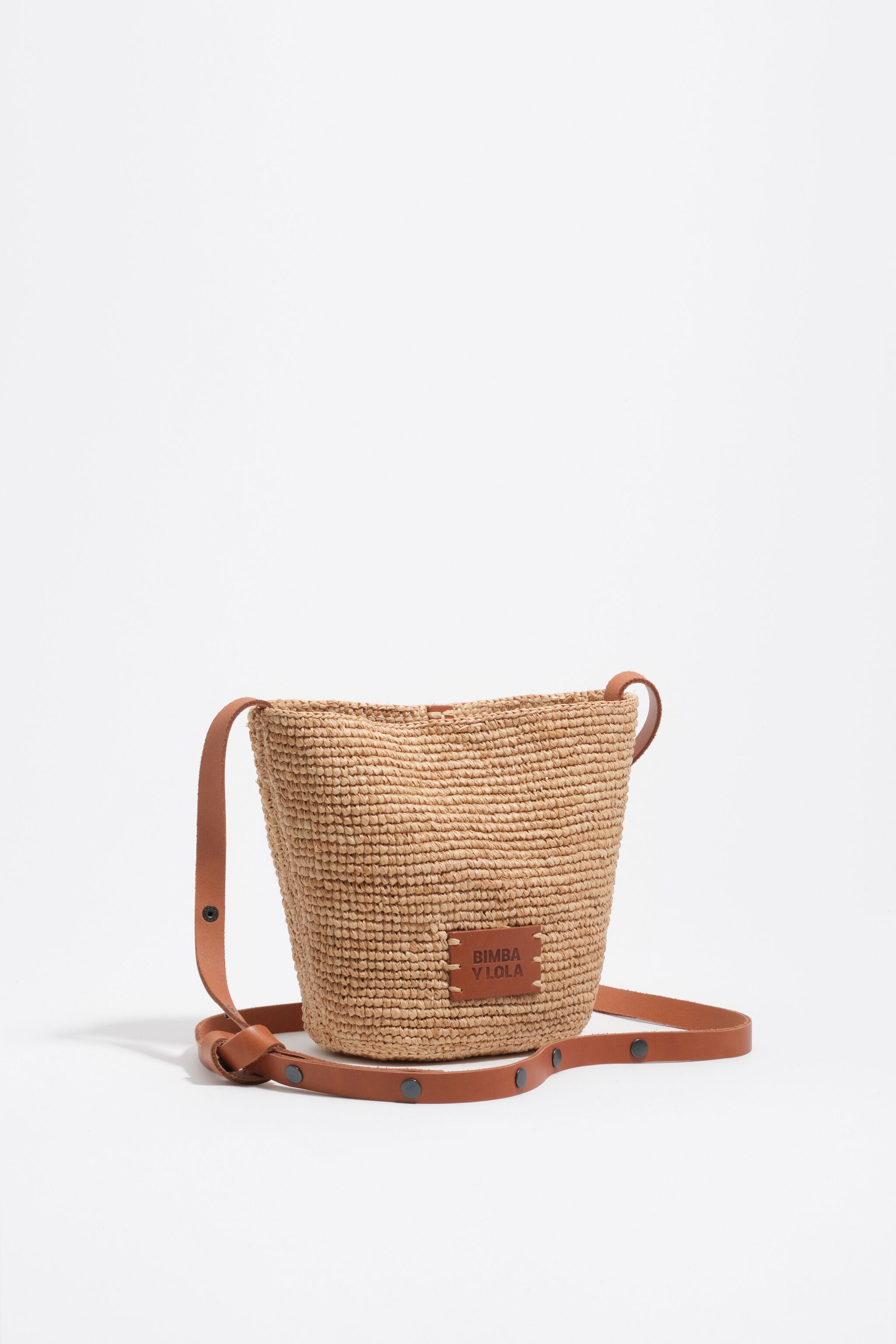 Small natural raffia plaited bag