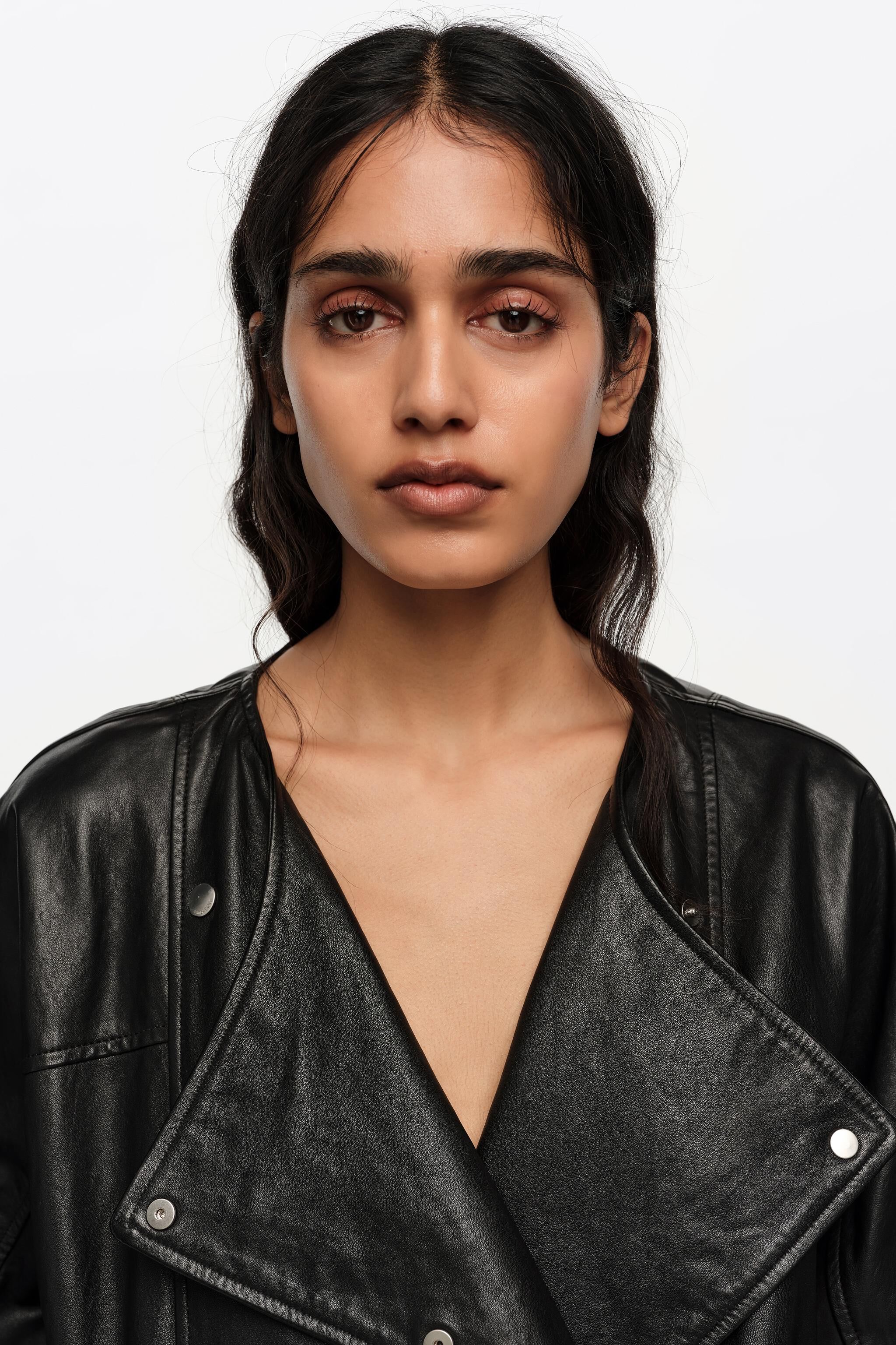 Black leather double-breasted jacket