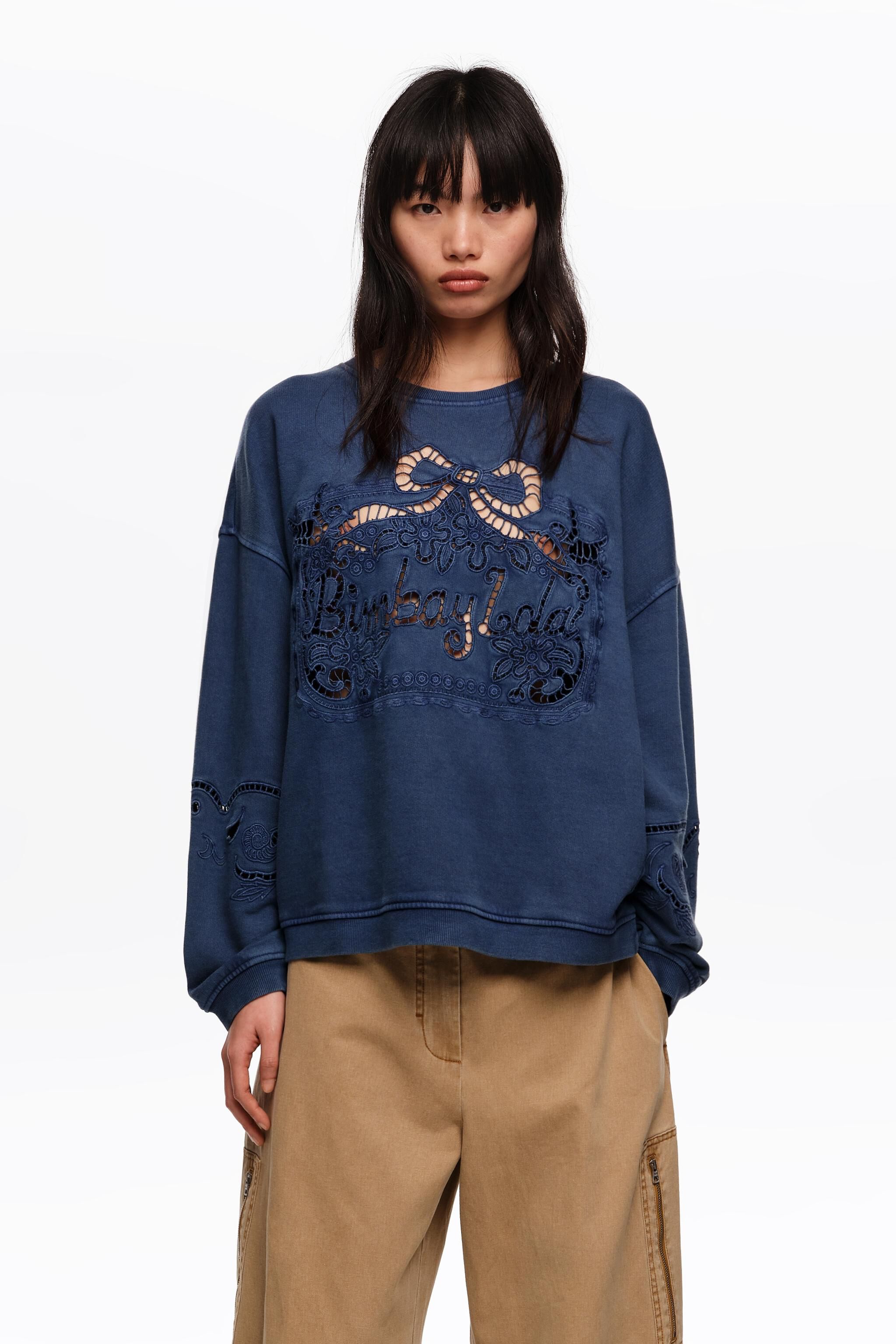 Faded blue sweatshirt with maxi broderie anglaise logo