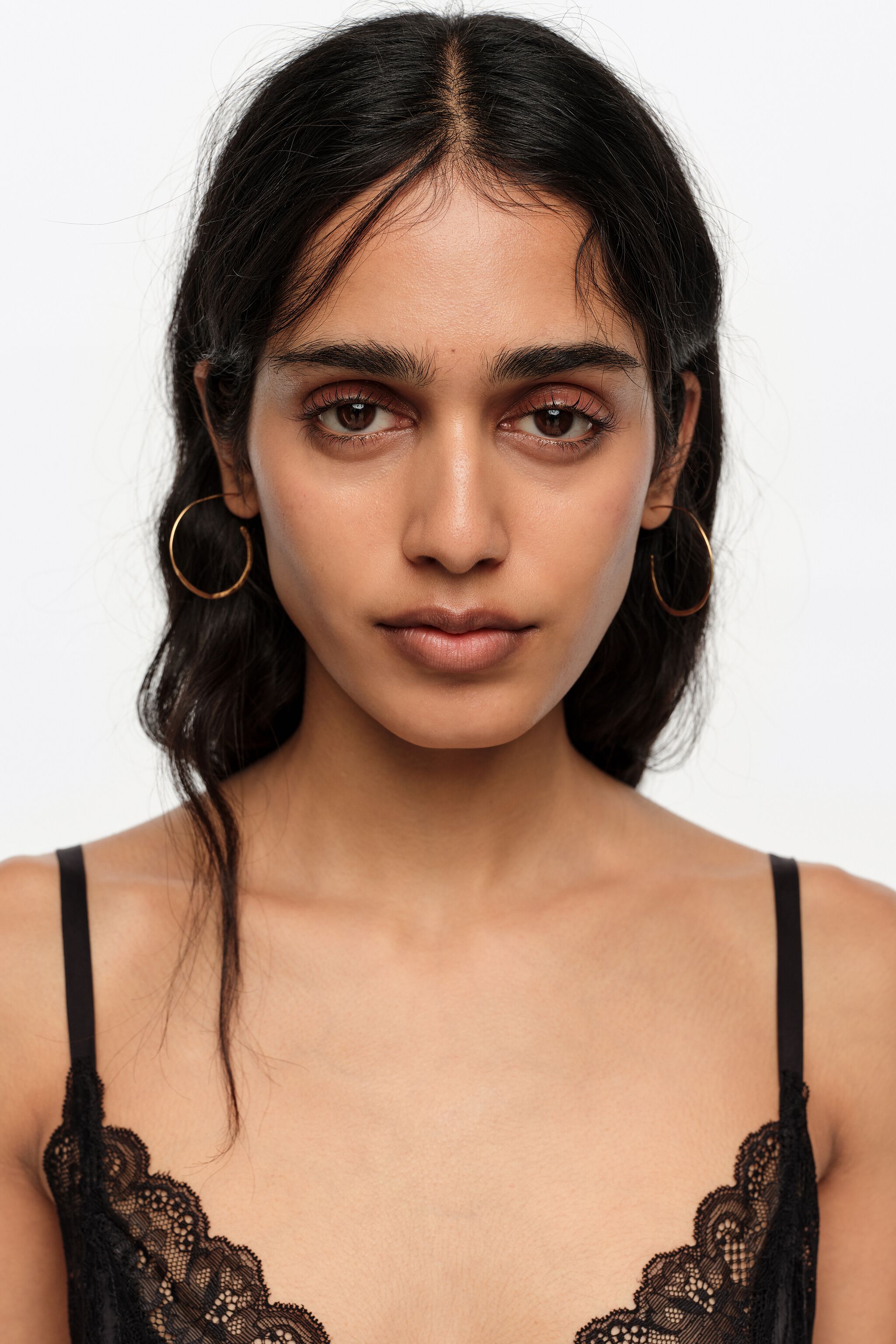Small aged gold textured hoop earrings