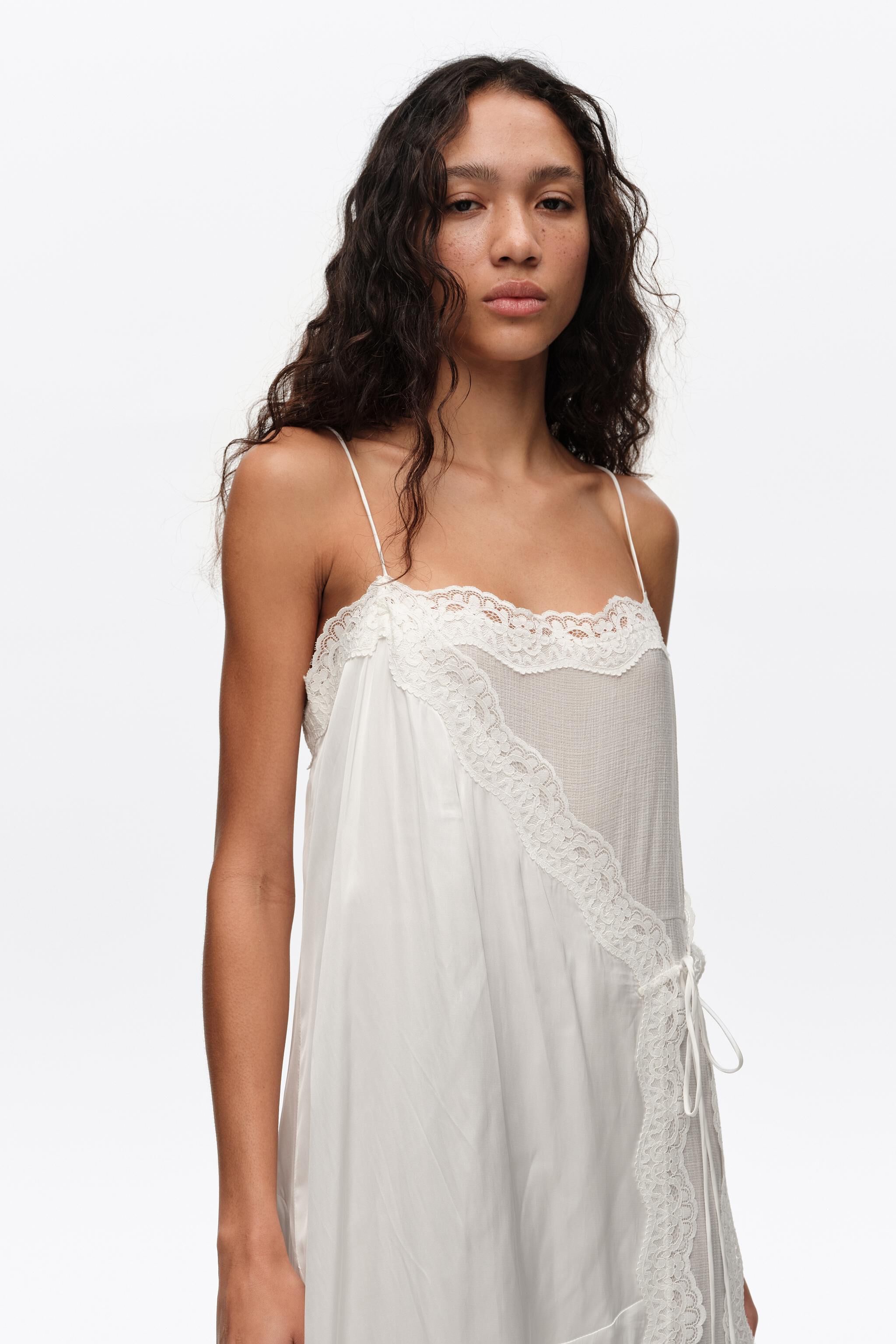 Off-white lace skirt-trouser hybrid