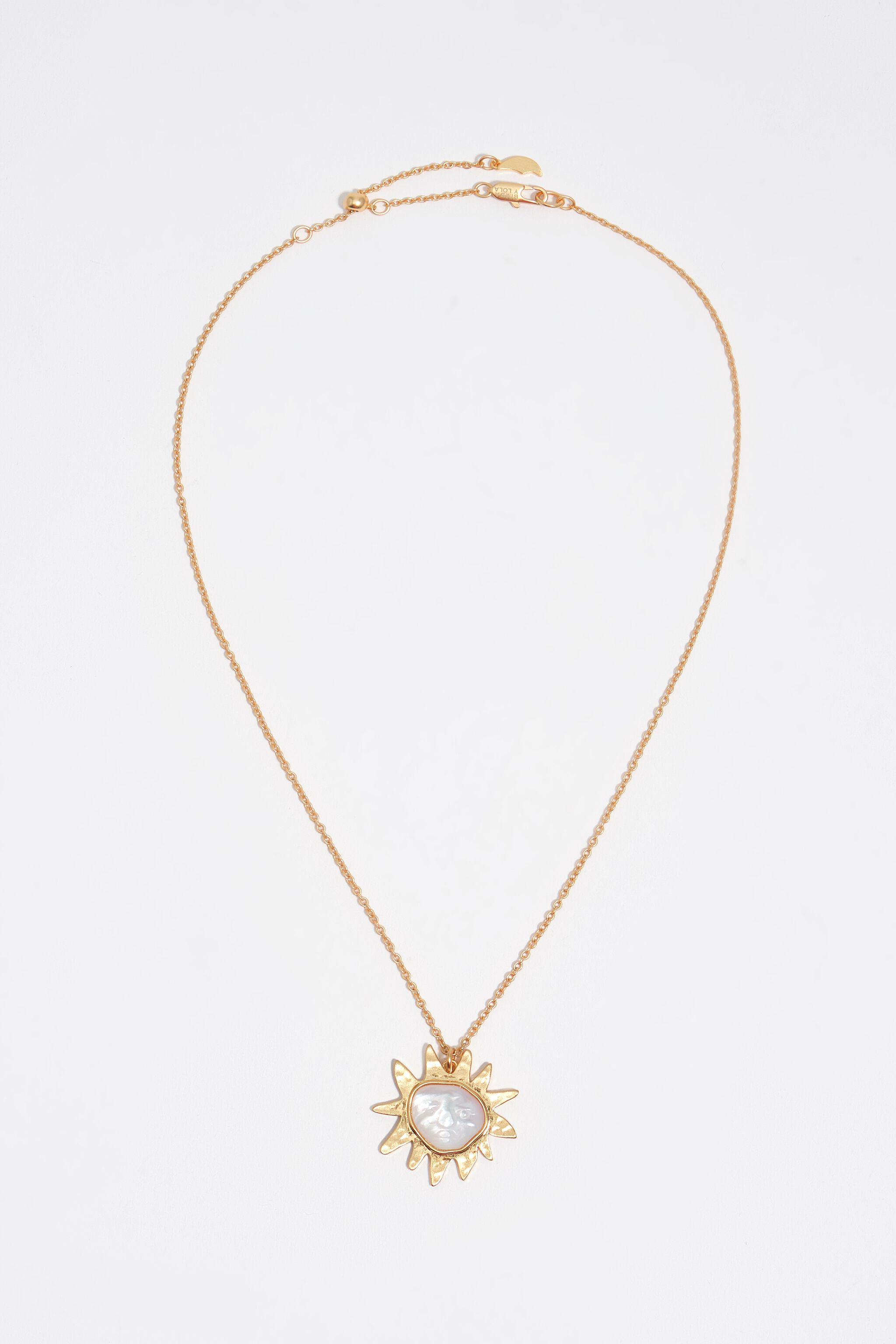 Brushed gold mother-of-pearl sun necklace