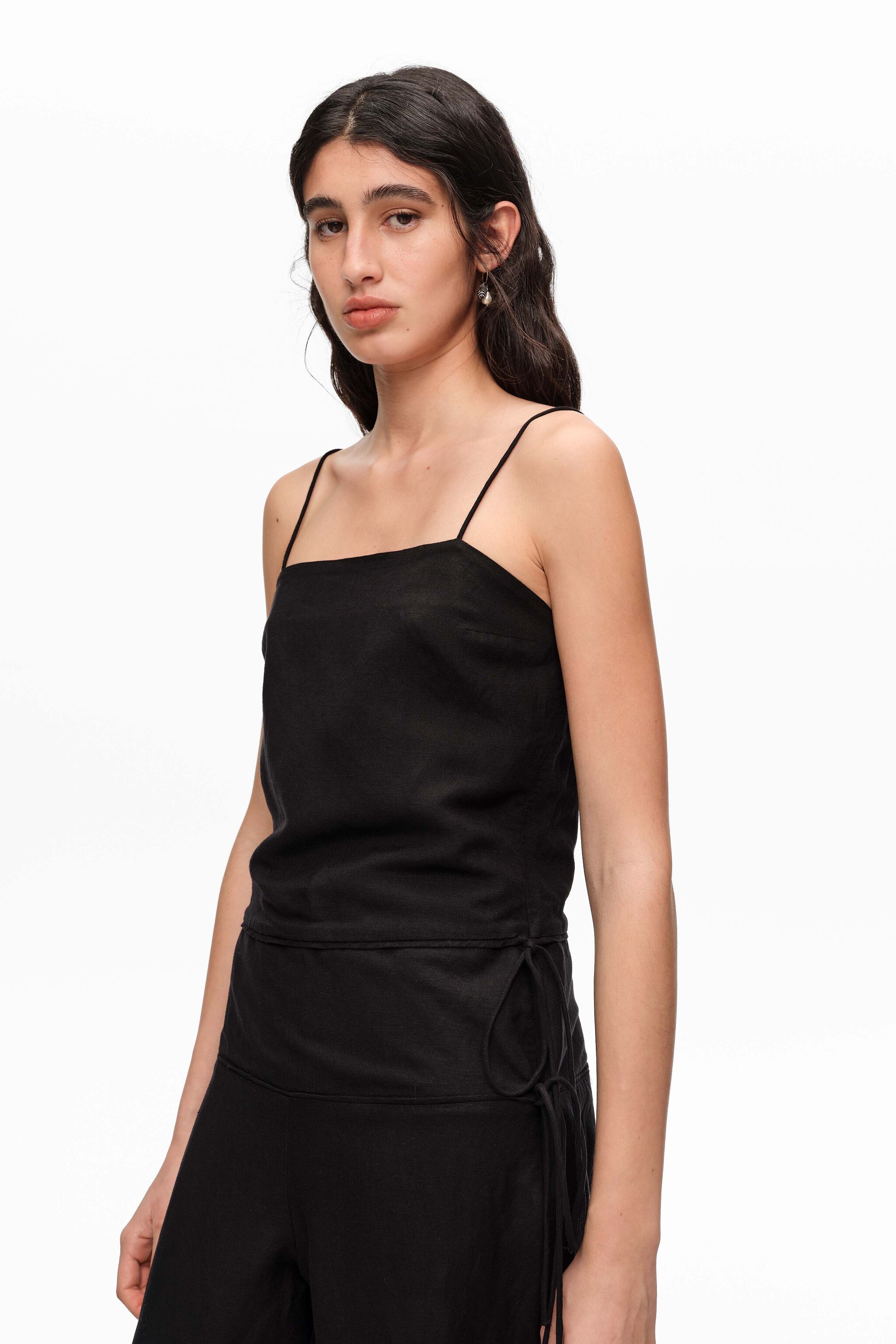 Black linen jumpsuit with adjustable waist and stones