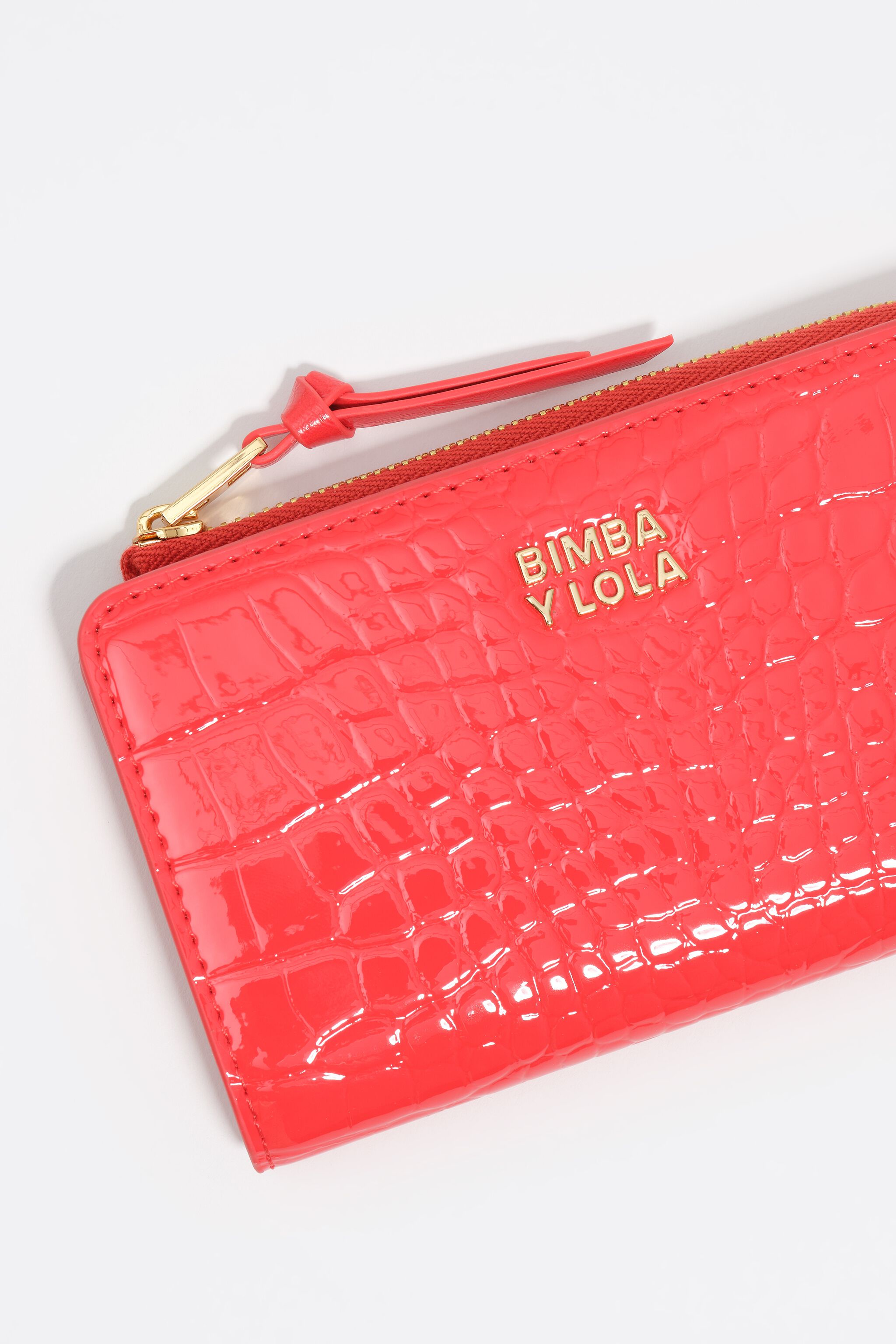 Coral mock croc leather compact purse