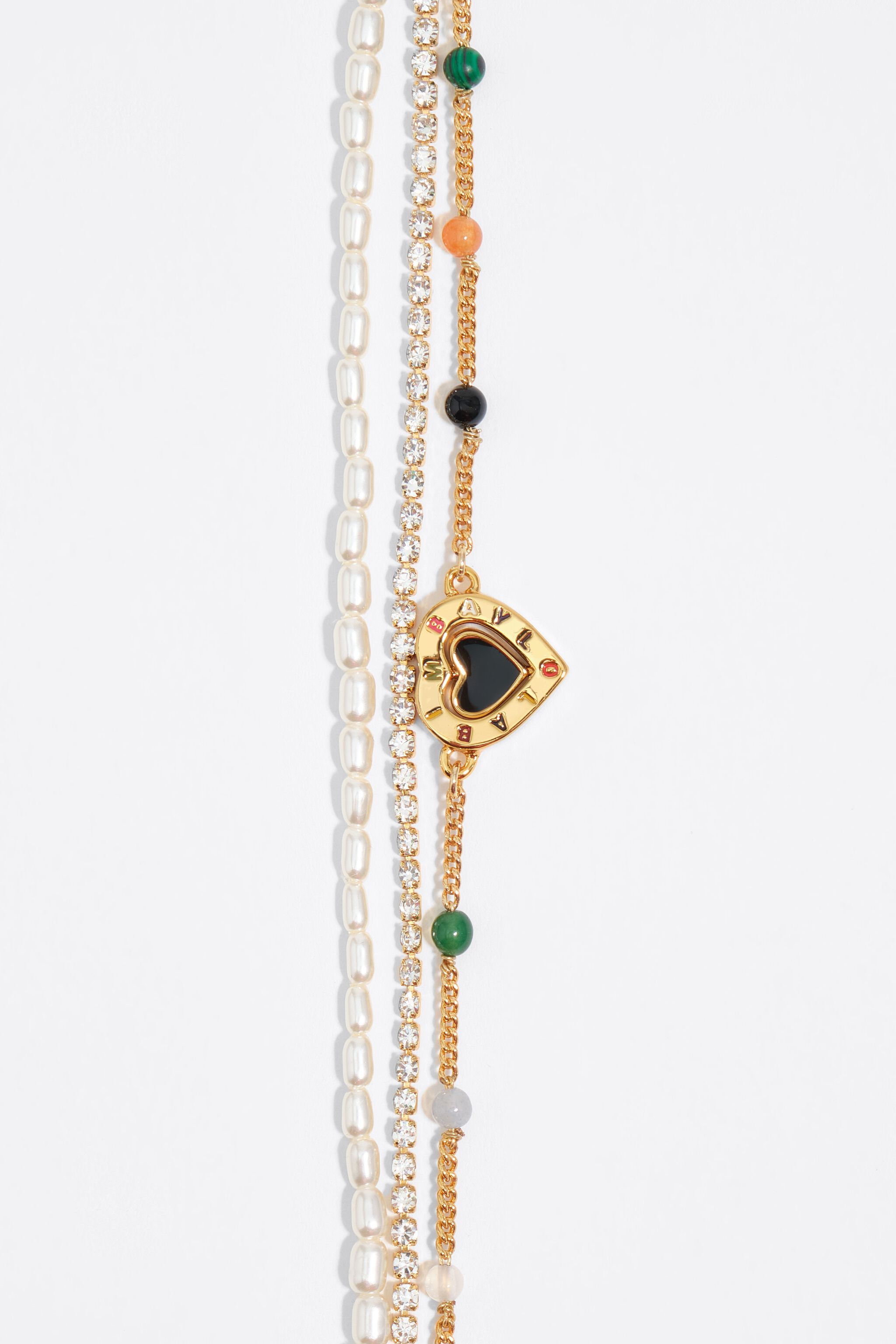Triple stone necklace with heart logo