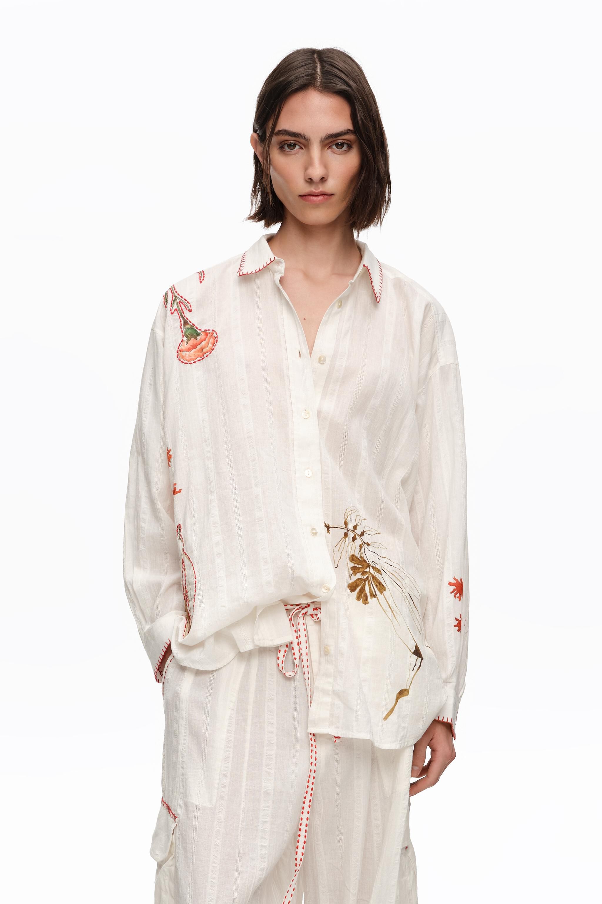 Ivory cotton shirt with stitching and prints