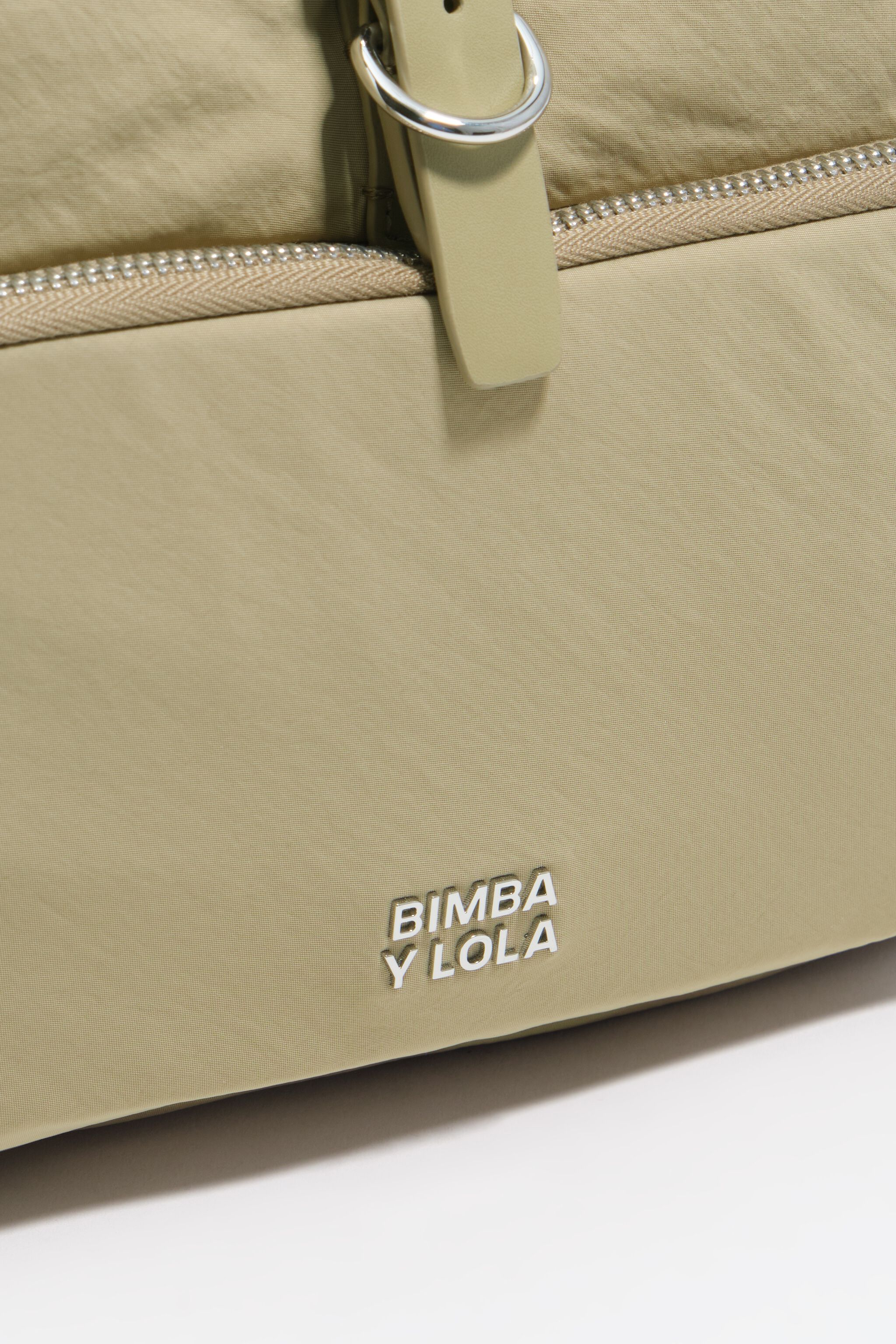 Light khaki nylon pocket backpack
