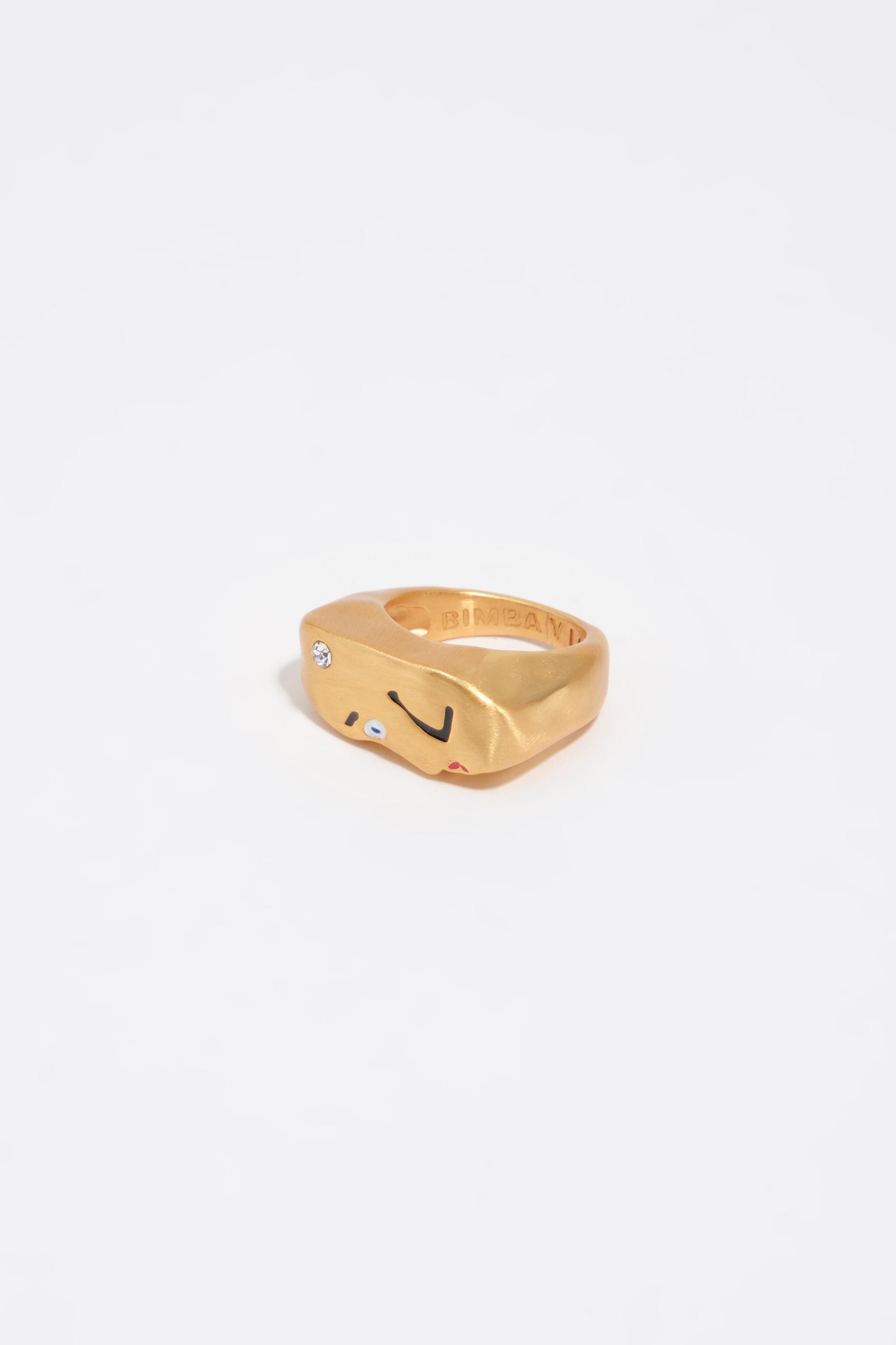Matte gold face and crystal ring