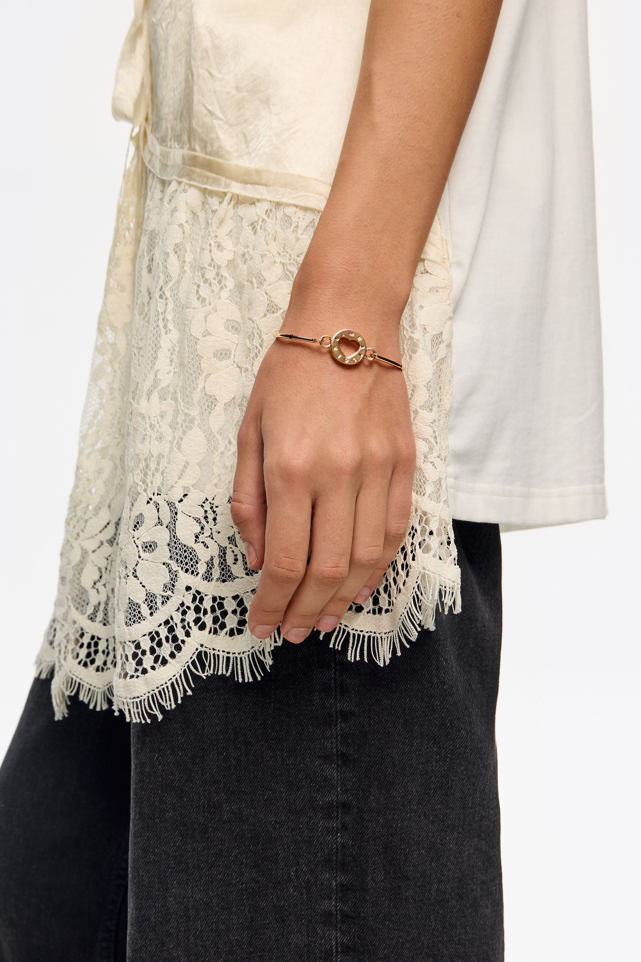 Gold rigid logo bracelet