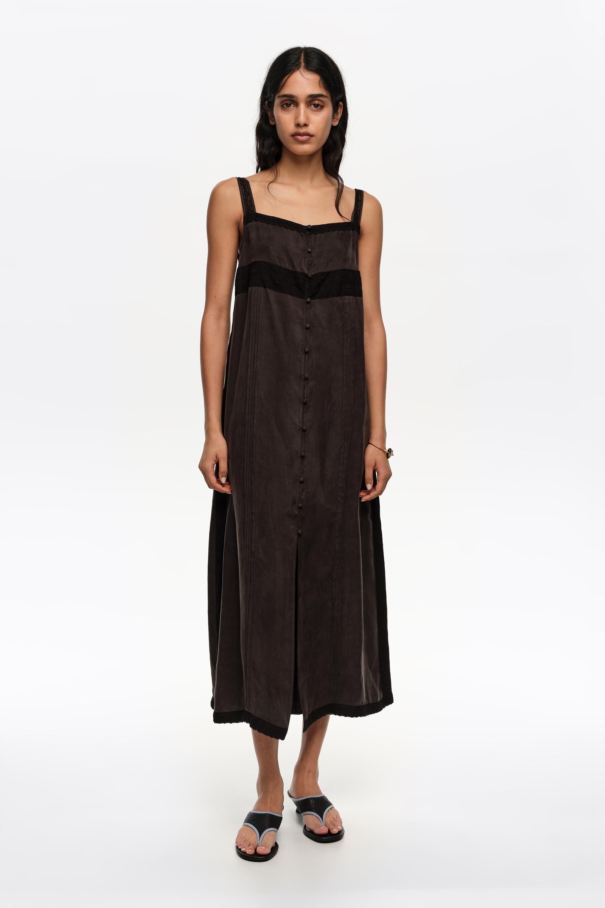 Washed black A-line dress with buttons and lace