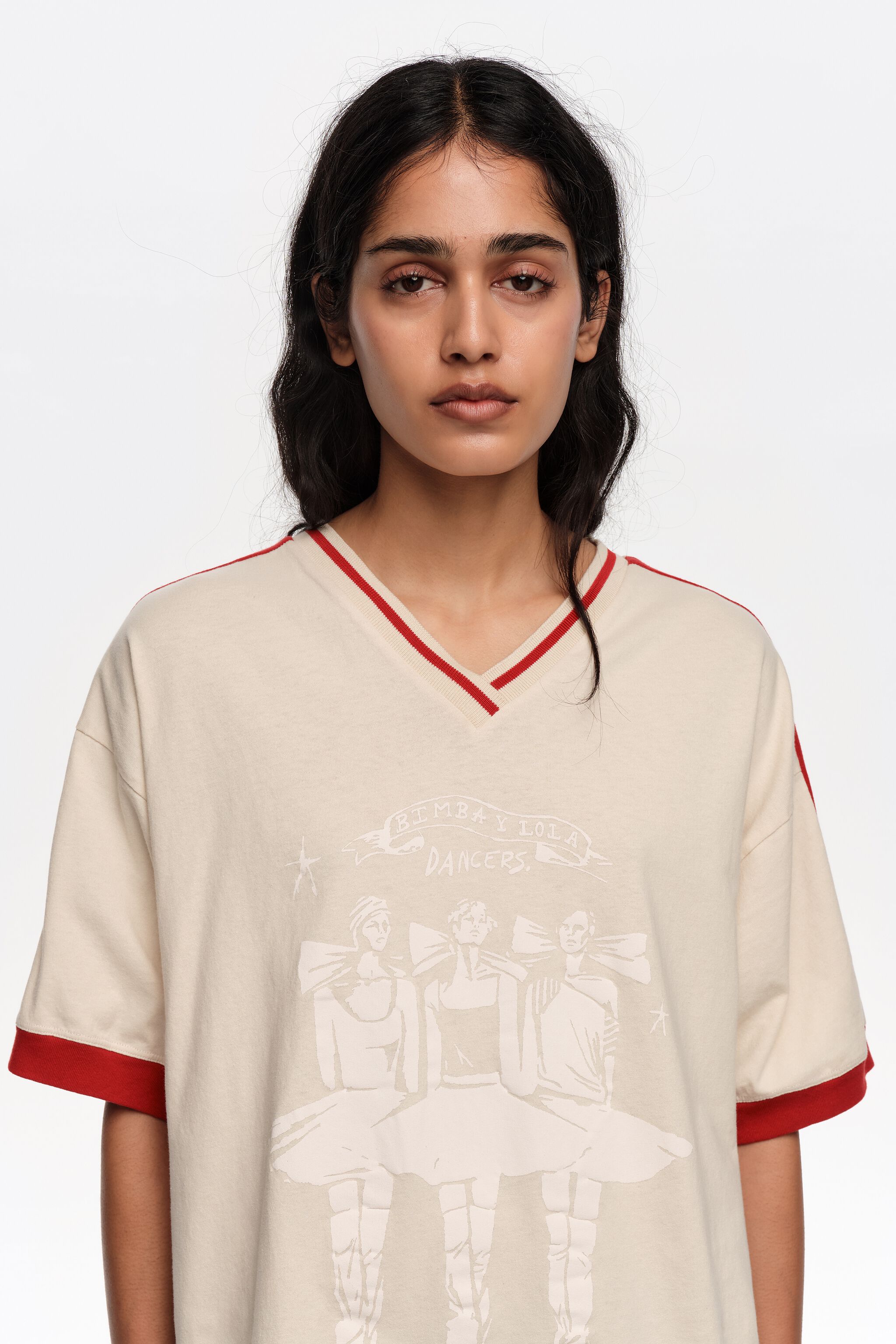 Ivory V-neckline Dancers logo T-shirt