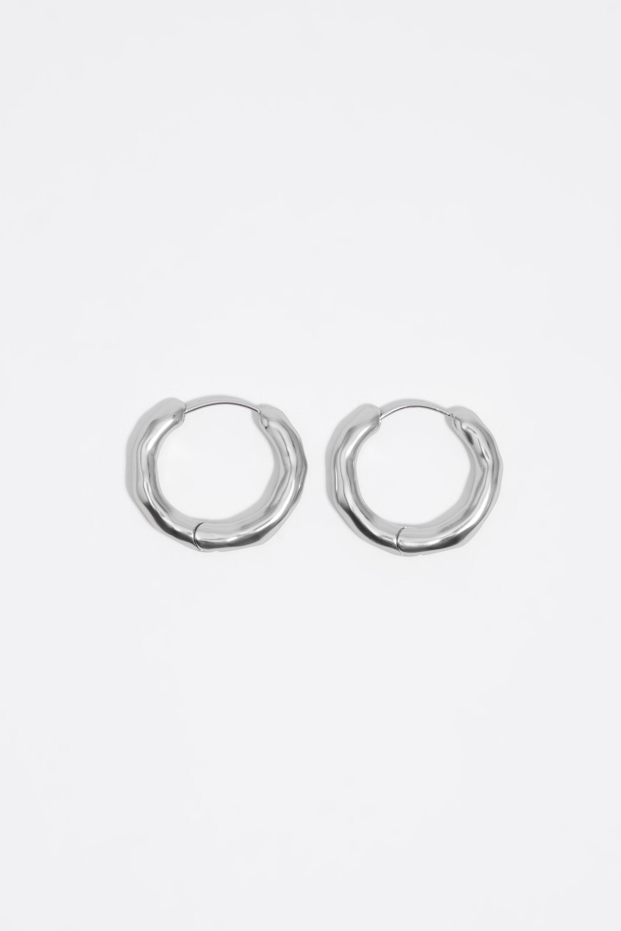 Silver irregular hoop earrings