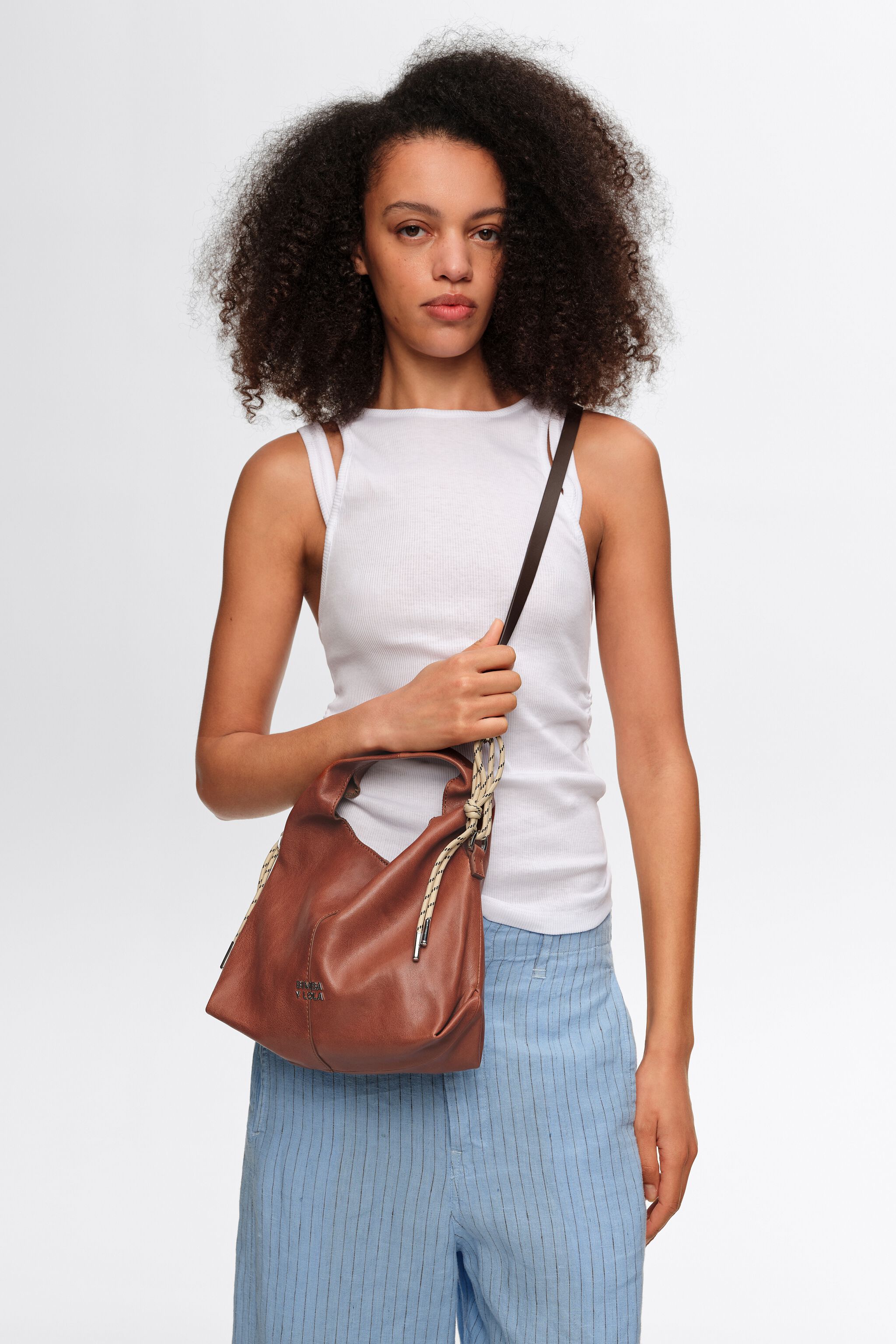 Small dark tan leather Paper crossbody bag
