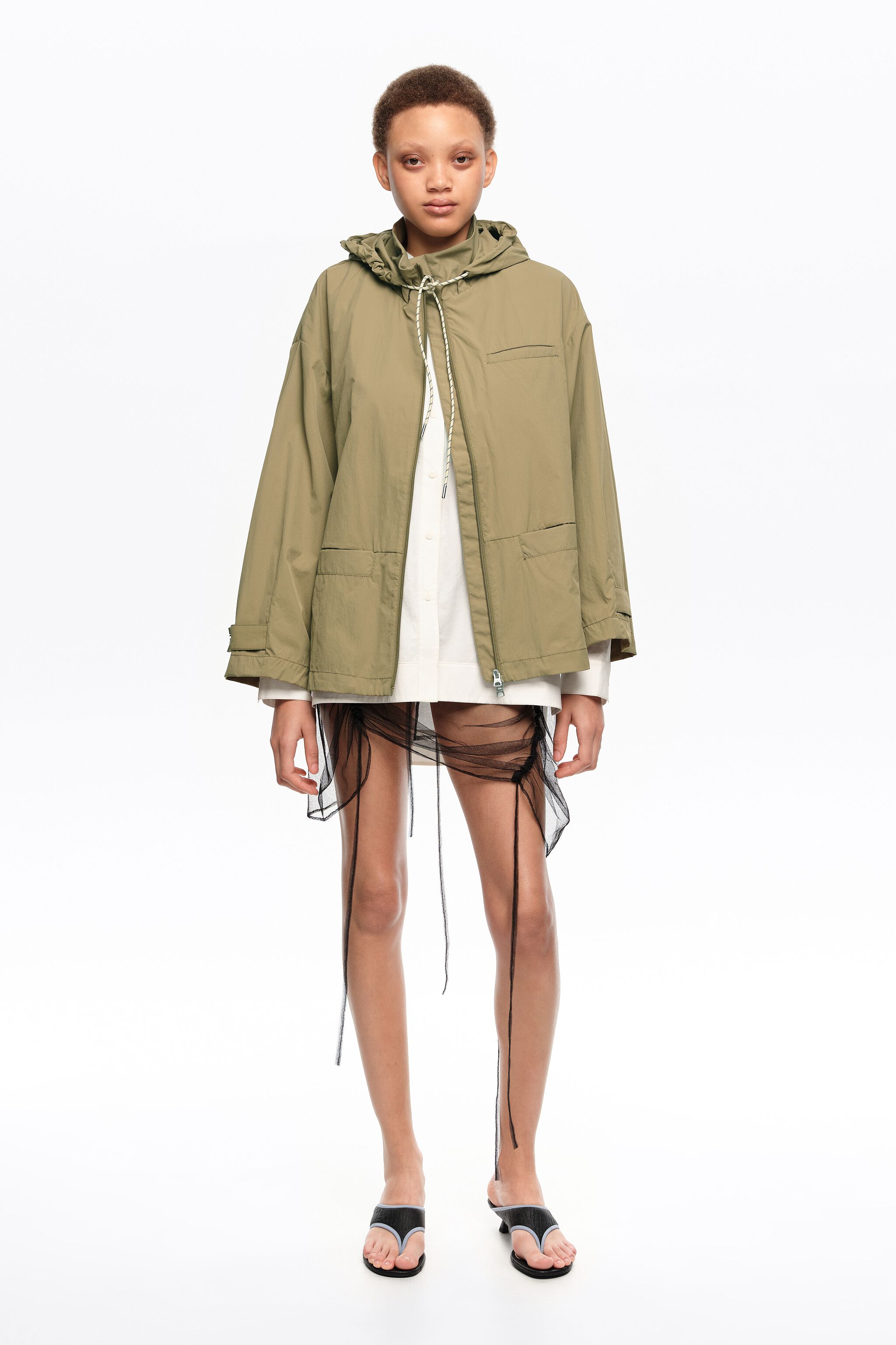 Short, khaki fluid A-line trench
