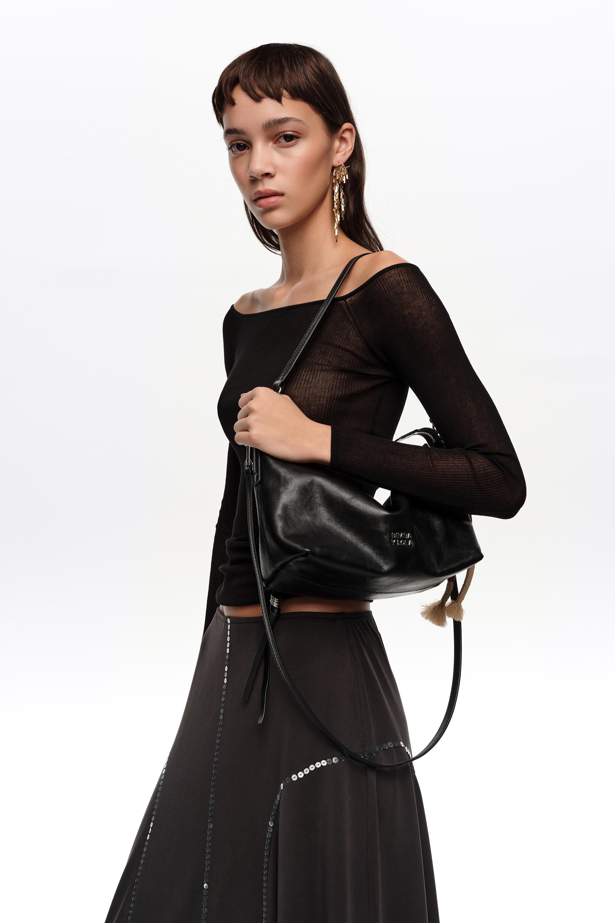 Medium black leather Trapecio bag