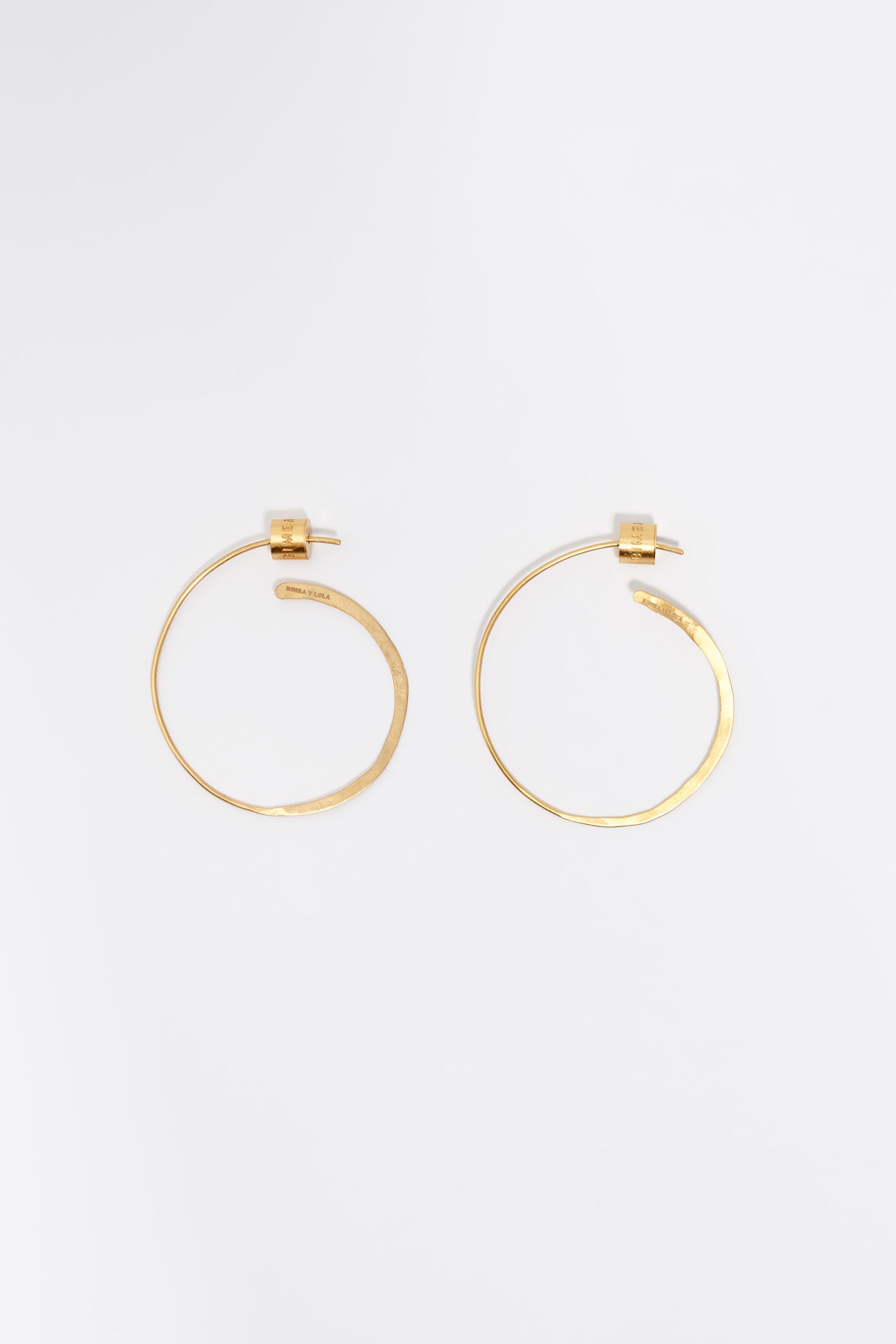 Small aged gold textured hoop earrings