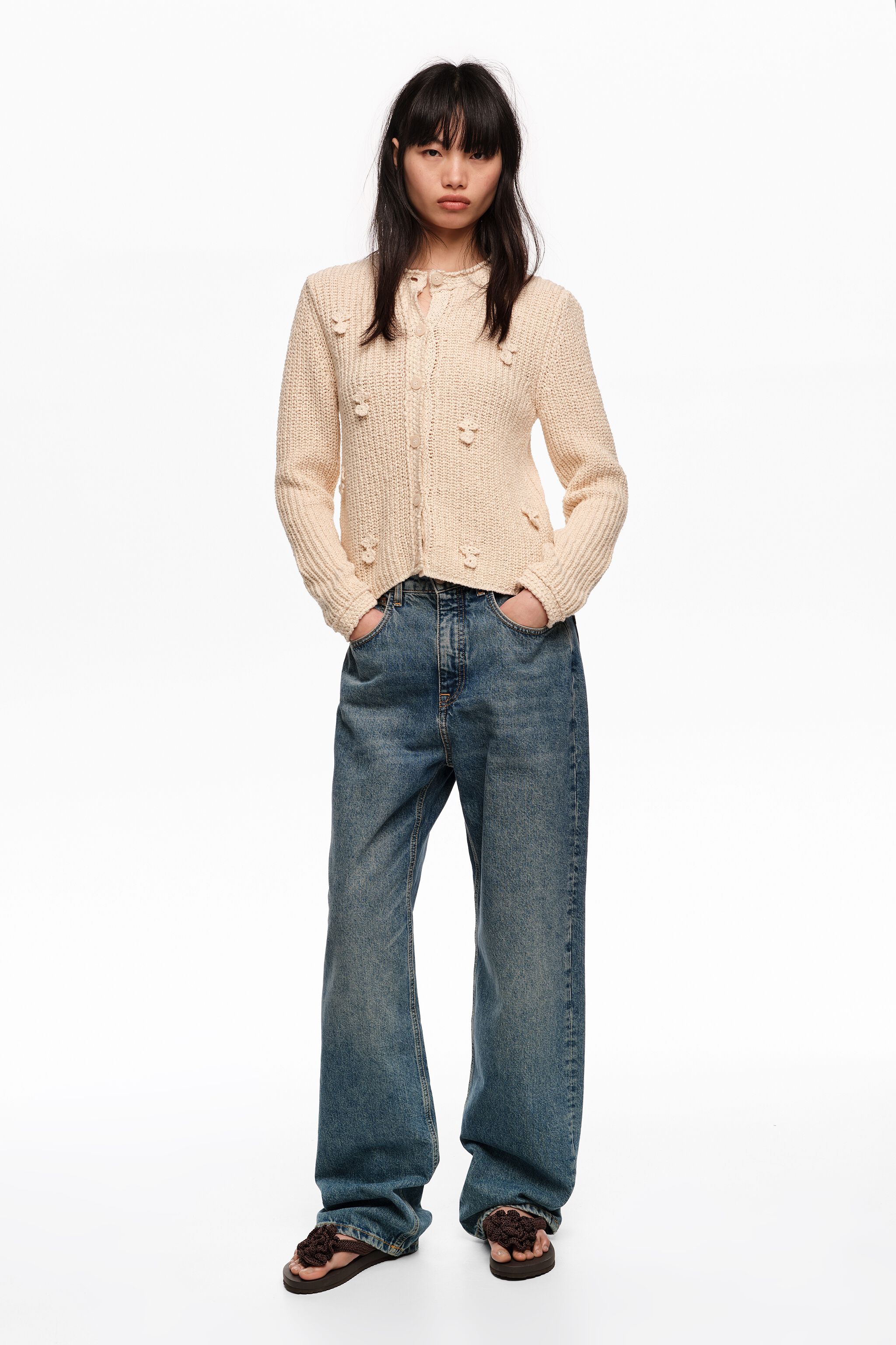 Beige cotton cardigan with flat bobbles