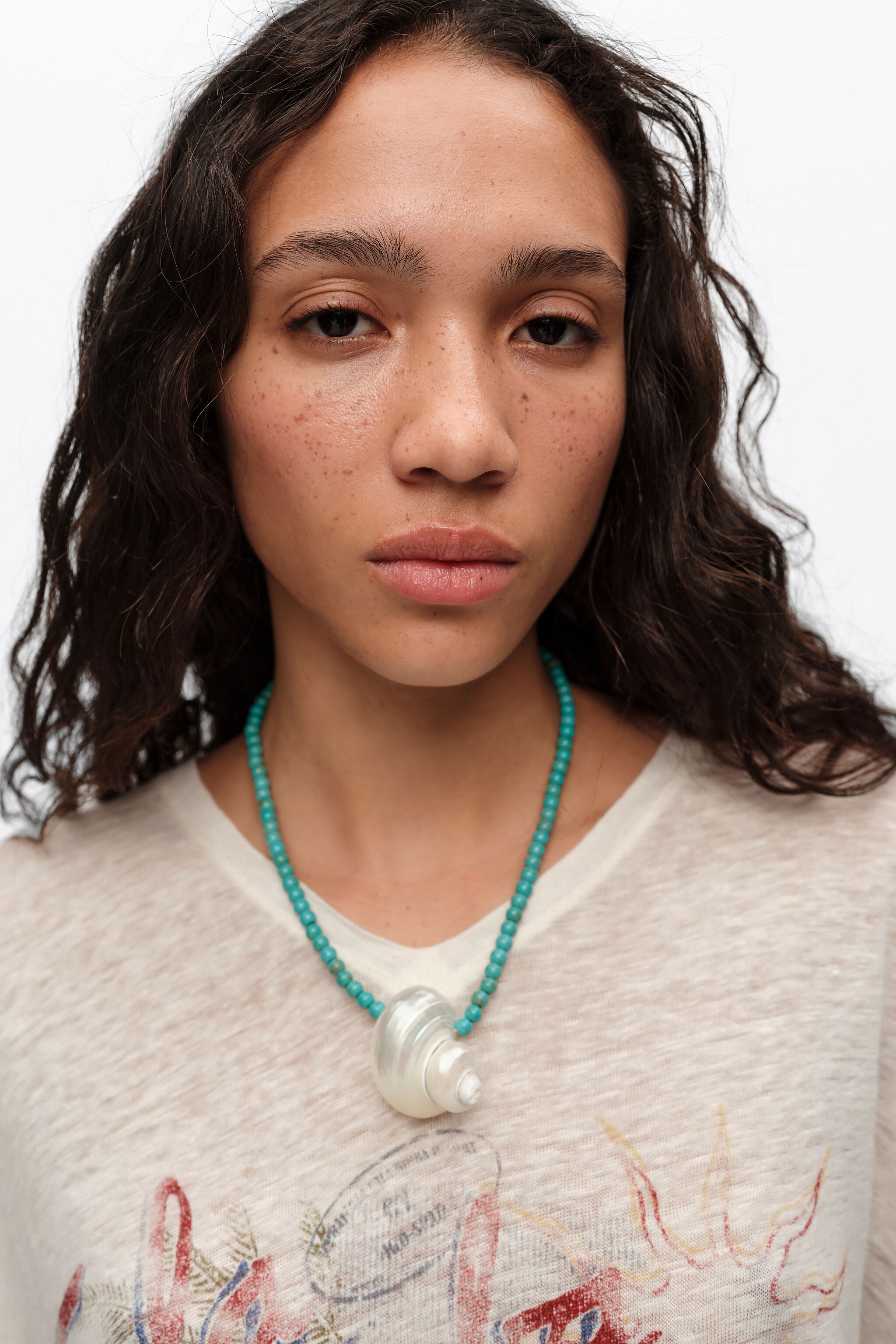 Necklace with natural seashell and turquoise stones