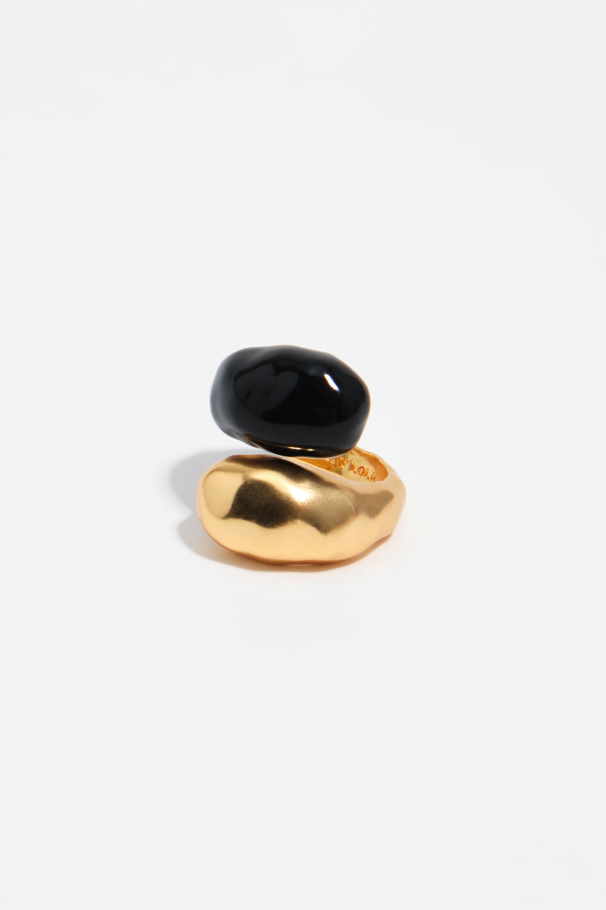 Matte gold textured criss-cross ring with black enamel