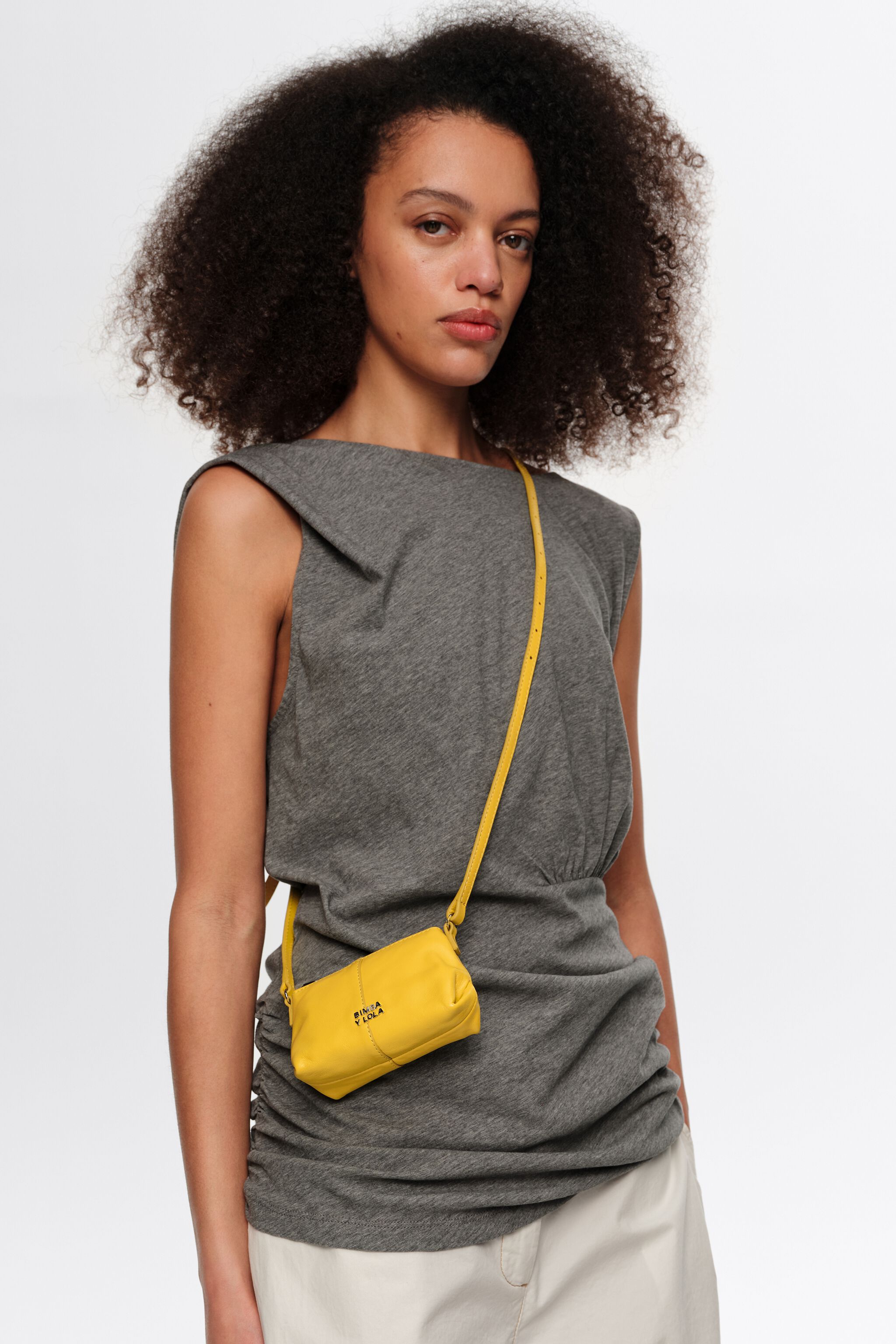Micro yellow leather crossbody bag
