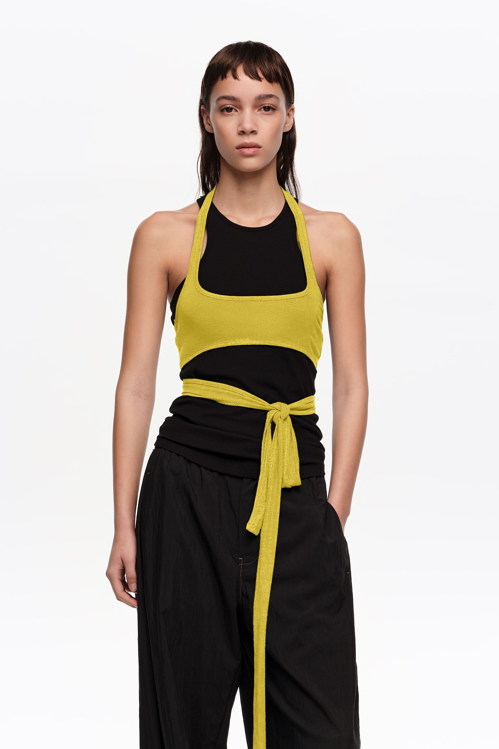 Top with overlay piece in contrast black