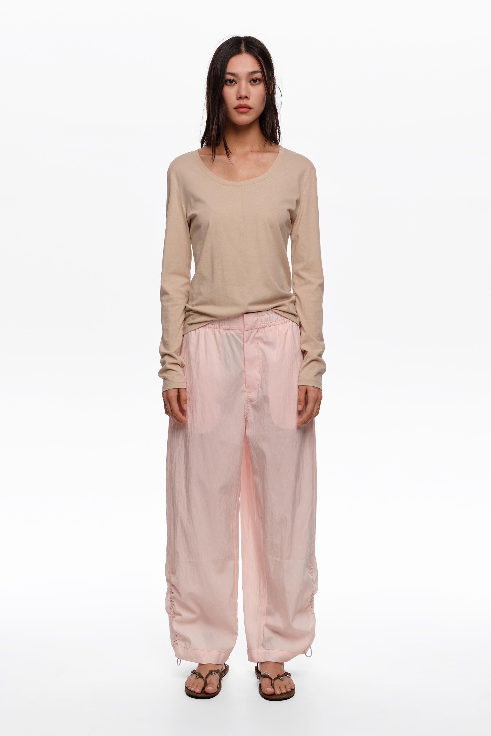 Light pink gathered jogger trousers