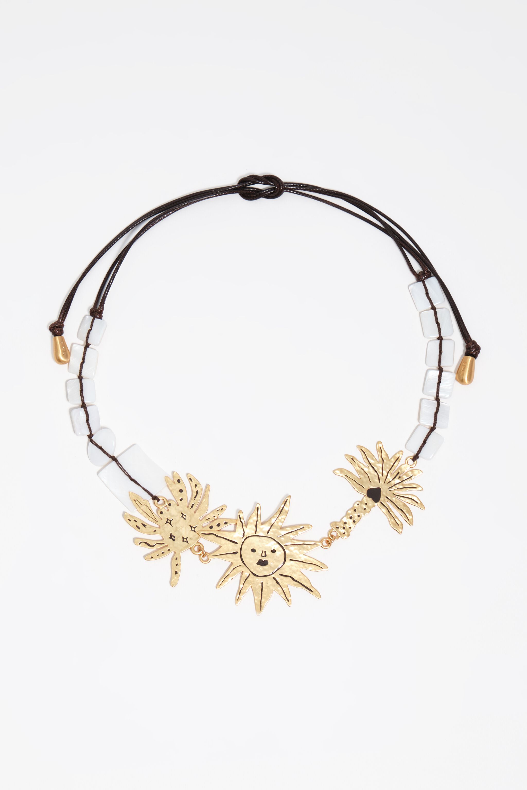 Brushed gold sun and animal necklace