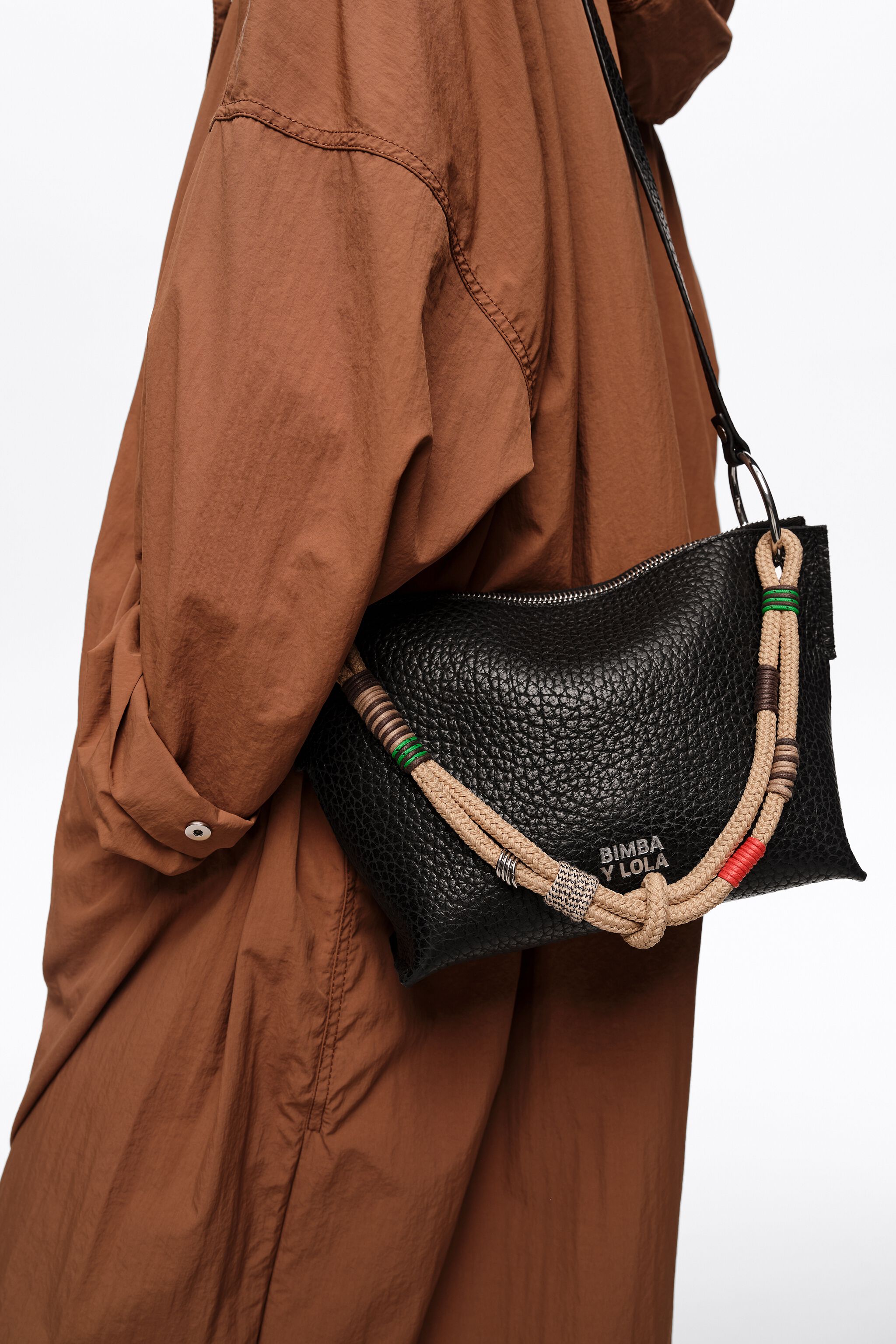 Medium black leather trapezium bag