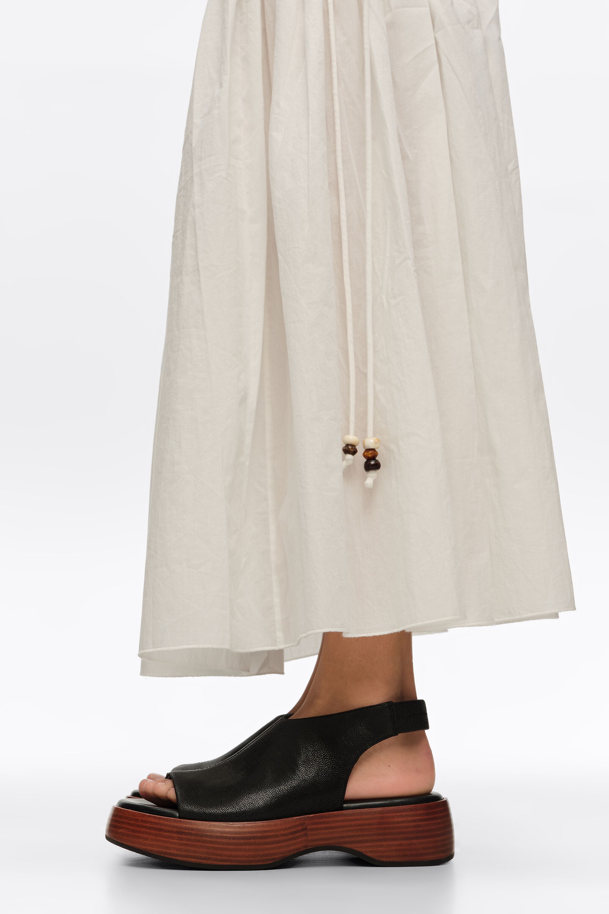Black leather platform closed-toe sandal