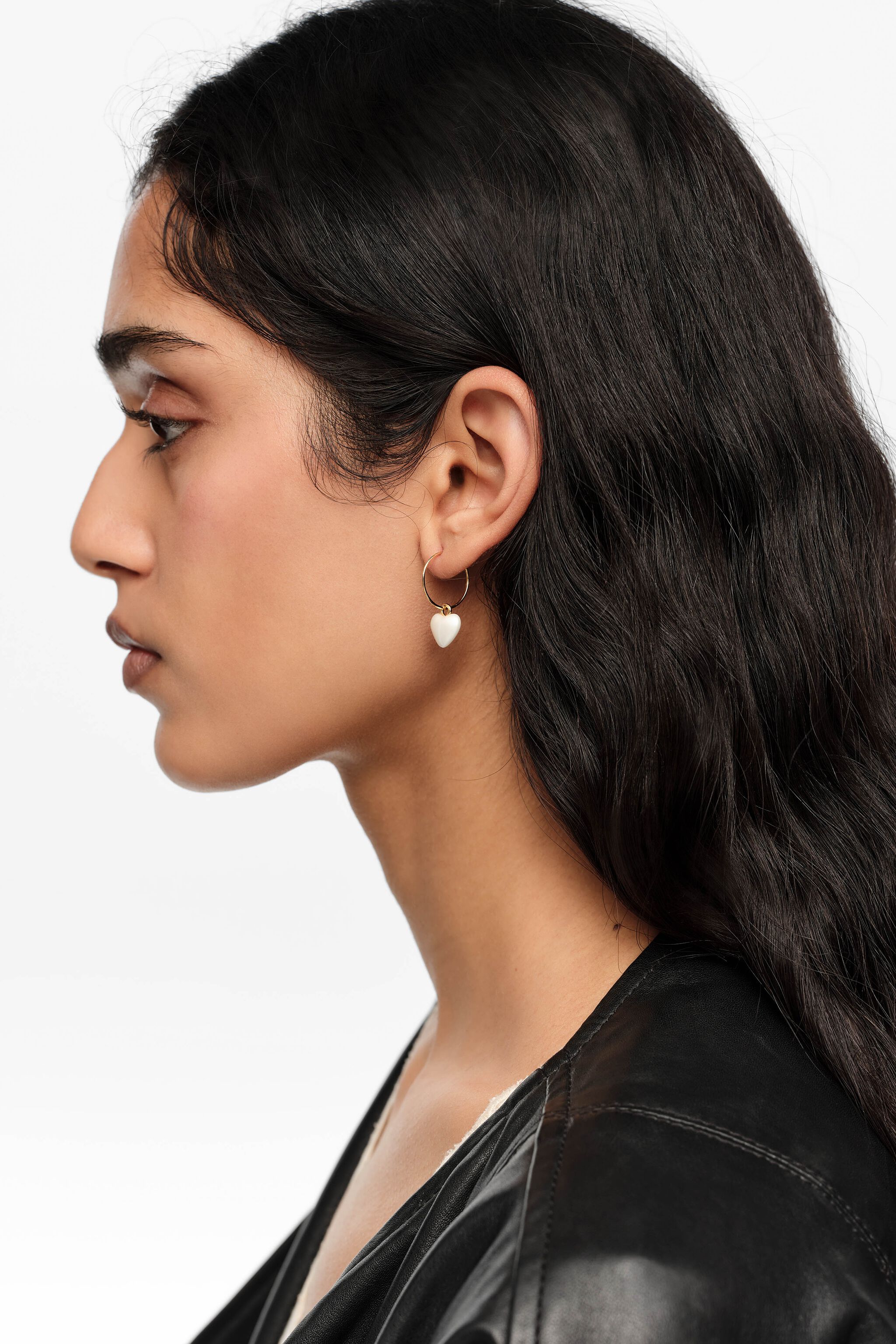 Gold hoop earrings and pearl heart