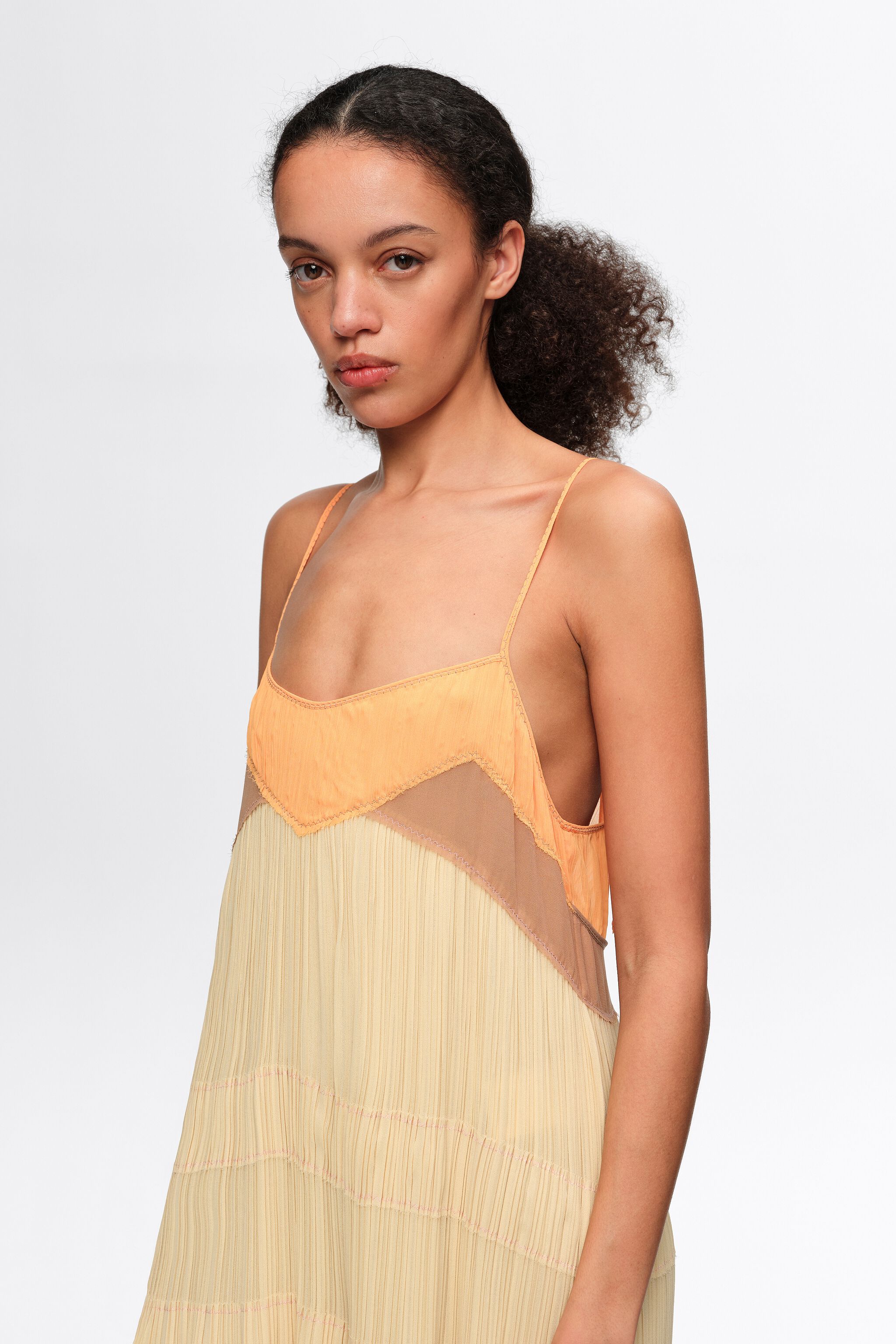 Light yellow pleated A-line strappy dress