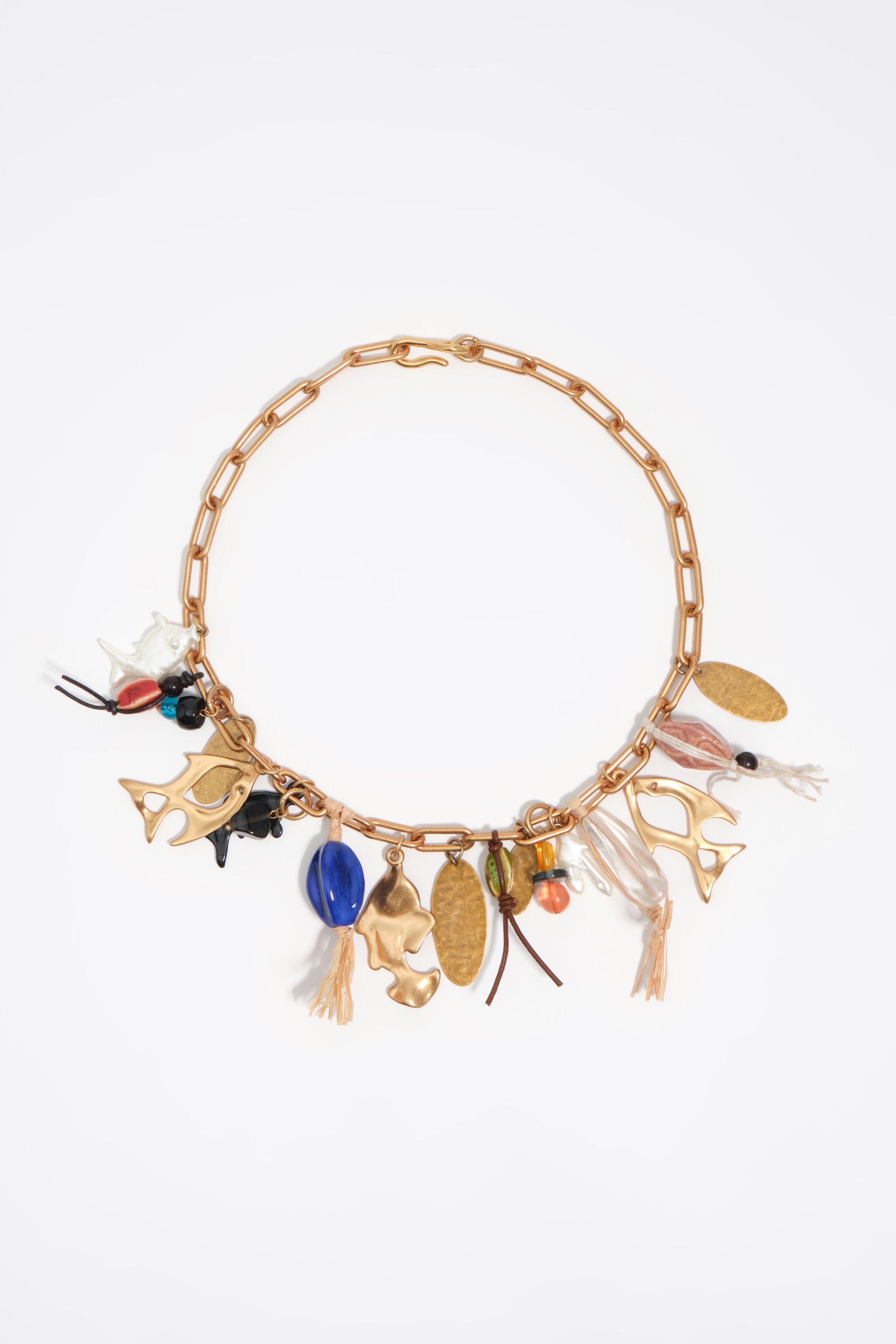 Necklace with aged gold fish and ceramics