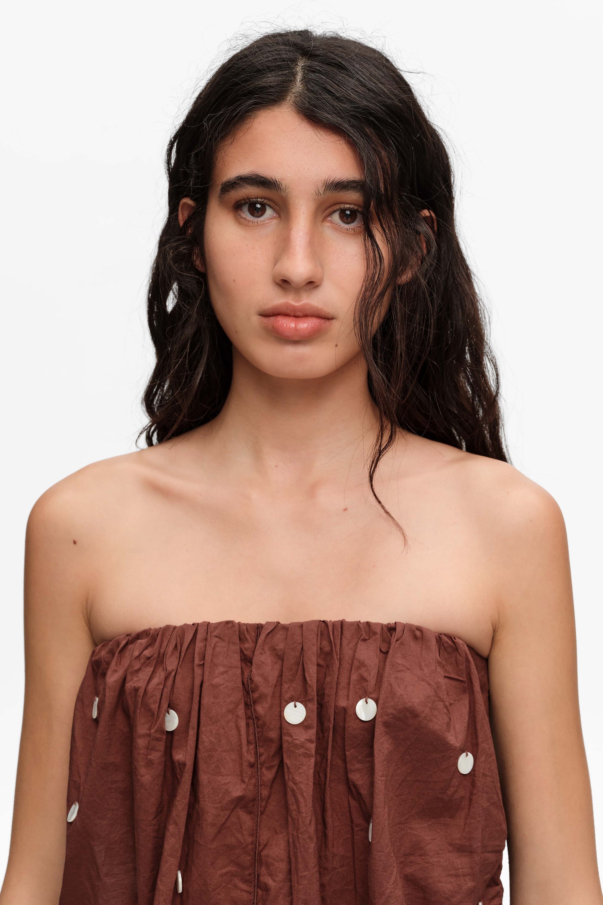 Brown ruched strapless top