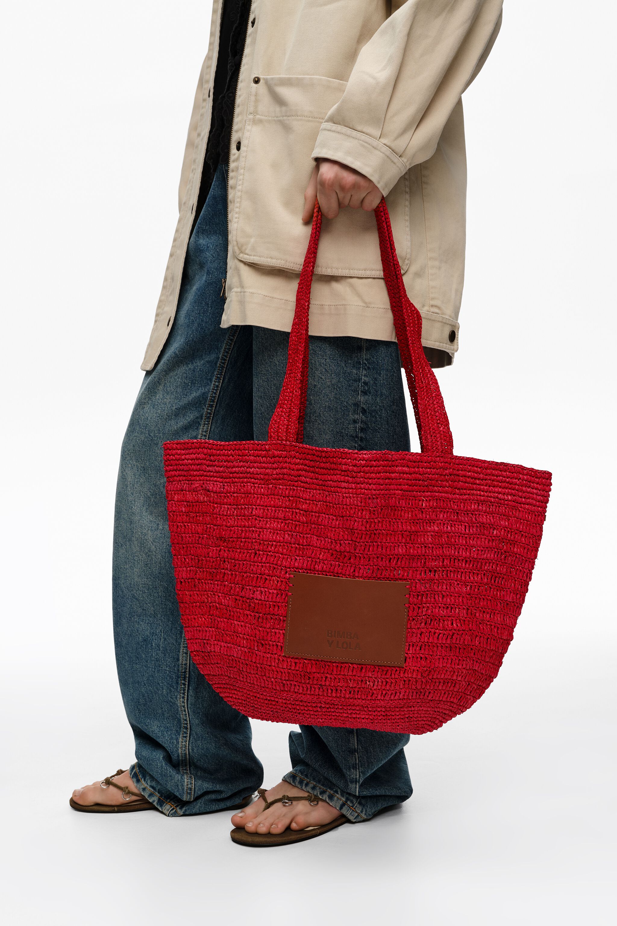 Large red plaited bag