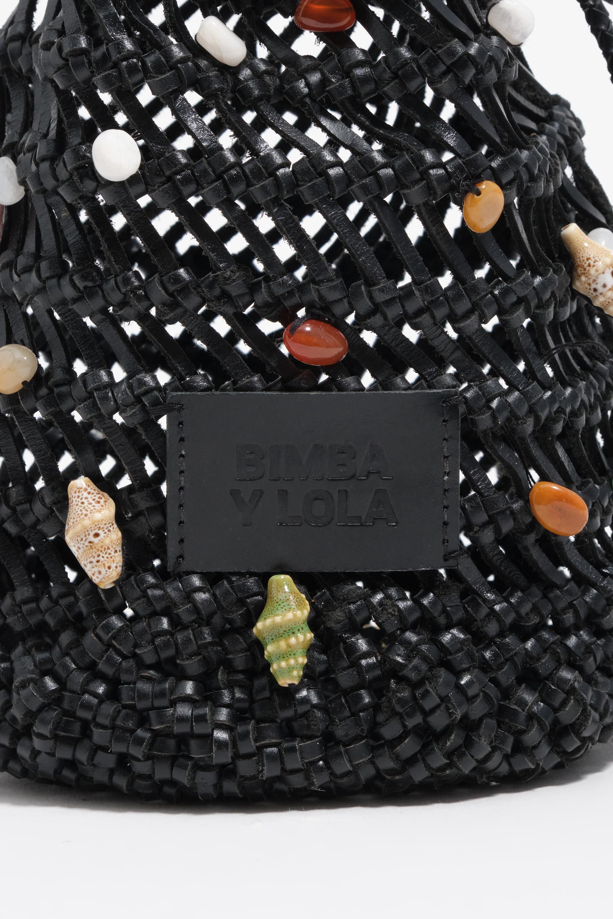 Black plaited leather mini bag