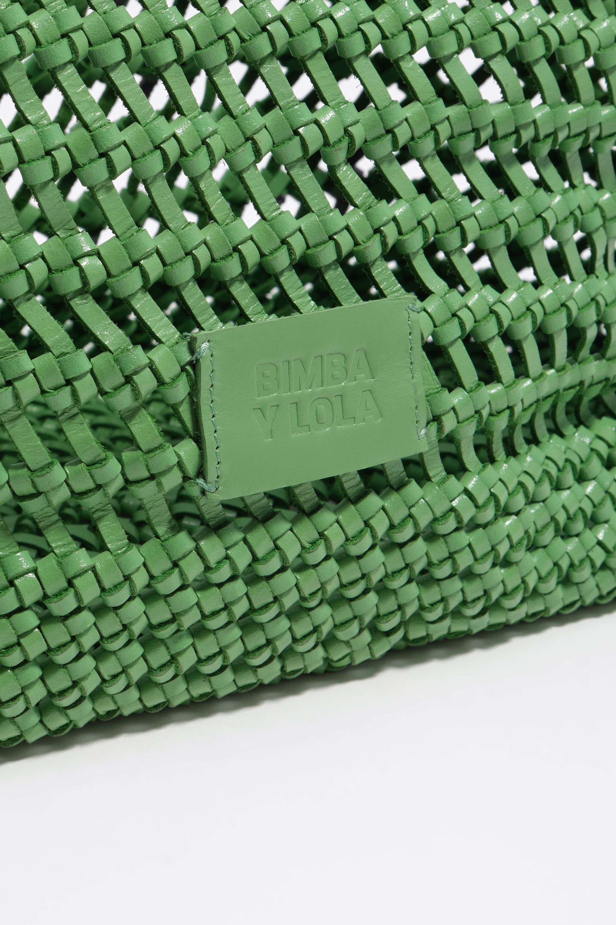 Large emerald plaited leather shopper bag