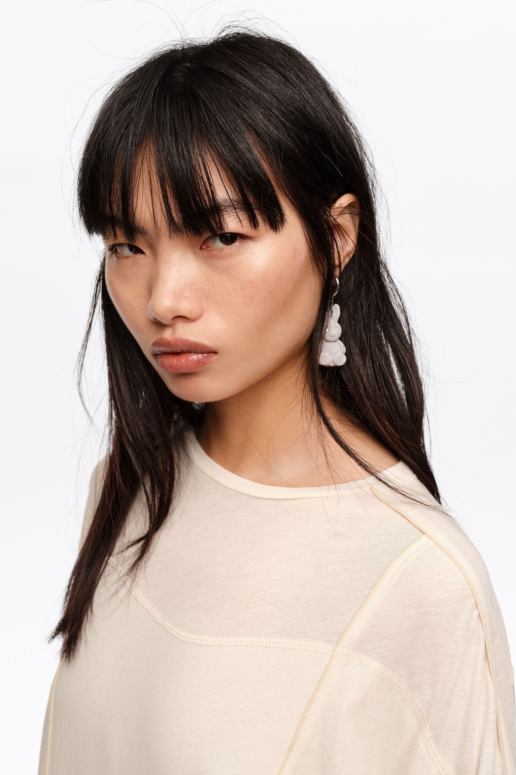 Gray flocked rabbit hoop earrings