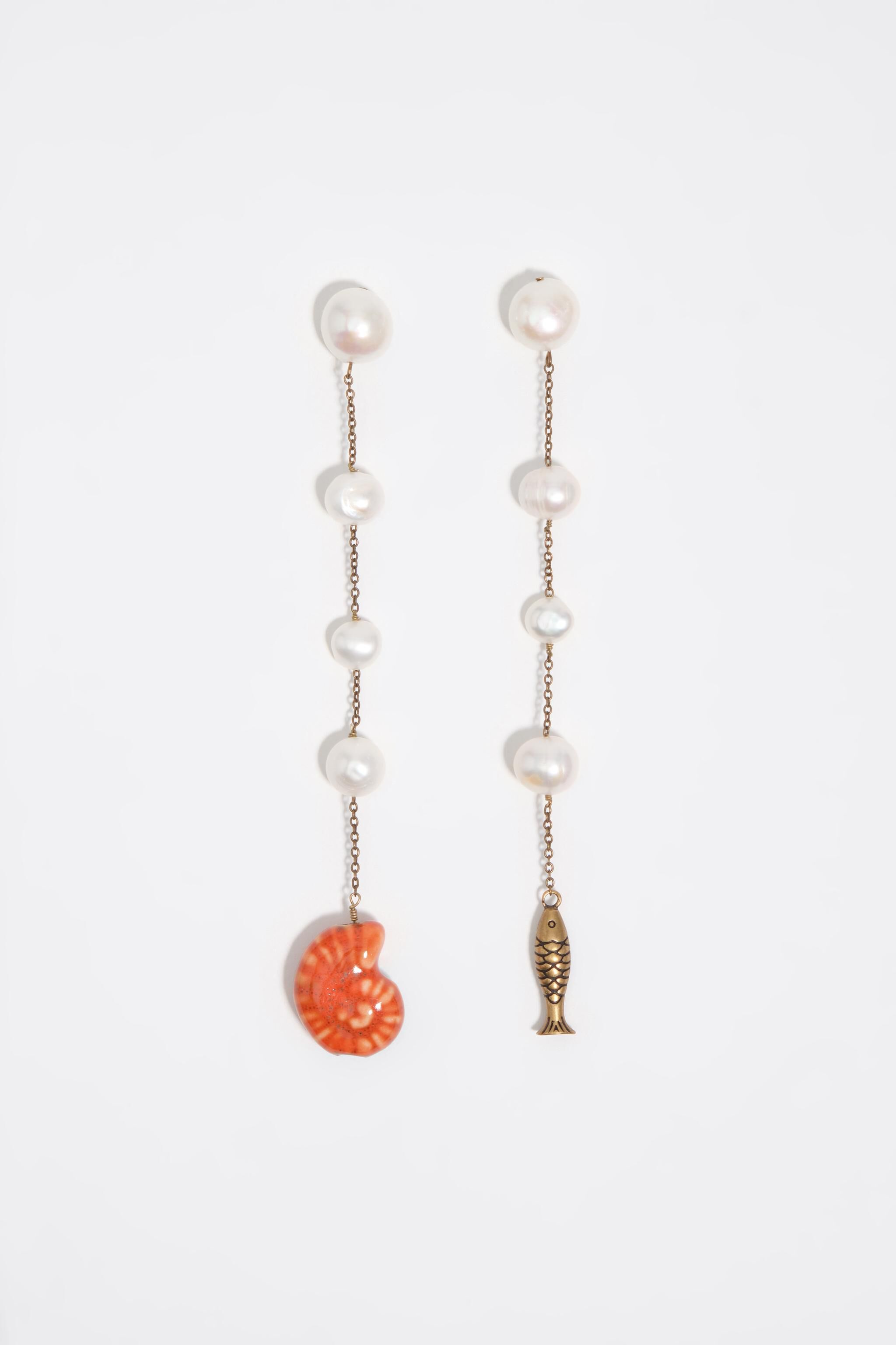 Pearl earrings with ceramic fish and seashell