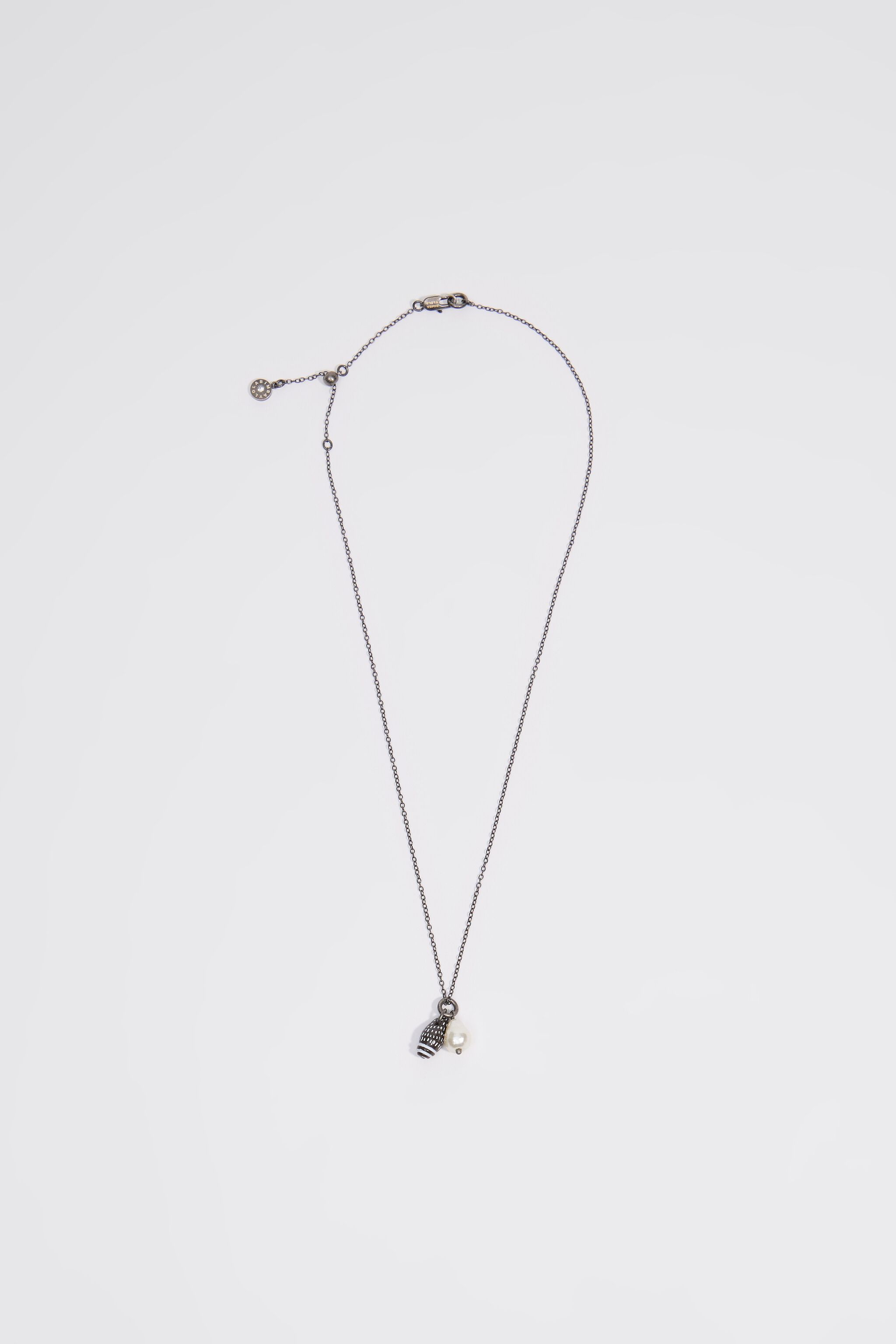 Aged silver necklace with seashell and pearl