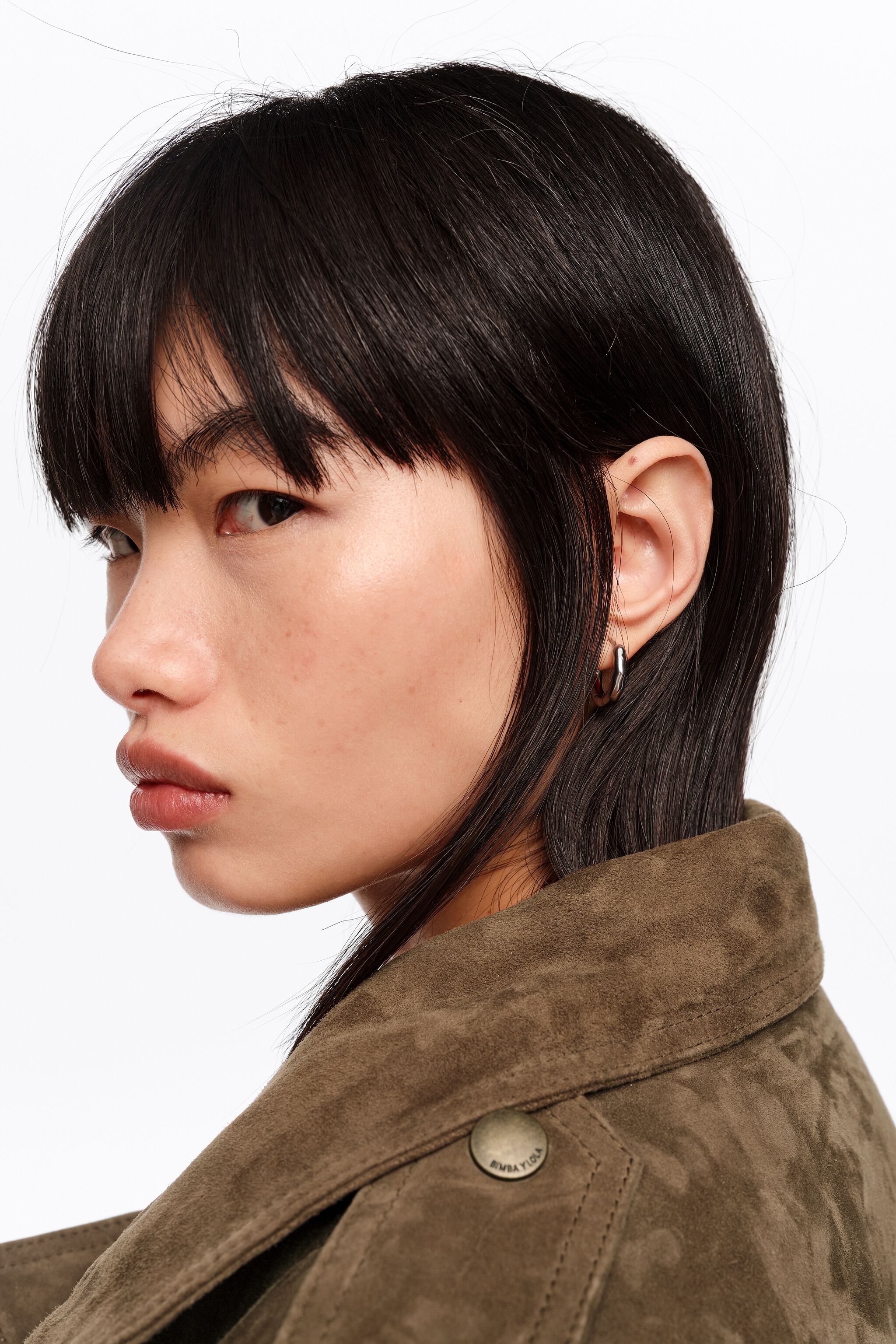 Small silver irregular hoop earrings