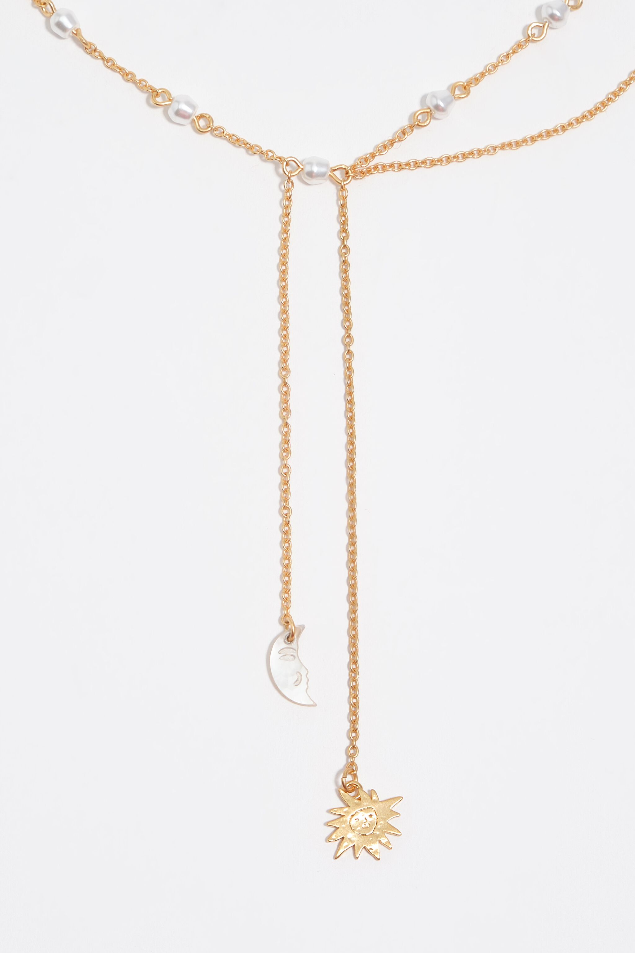 Sun and moon necklace with brushed gold chains