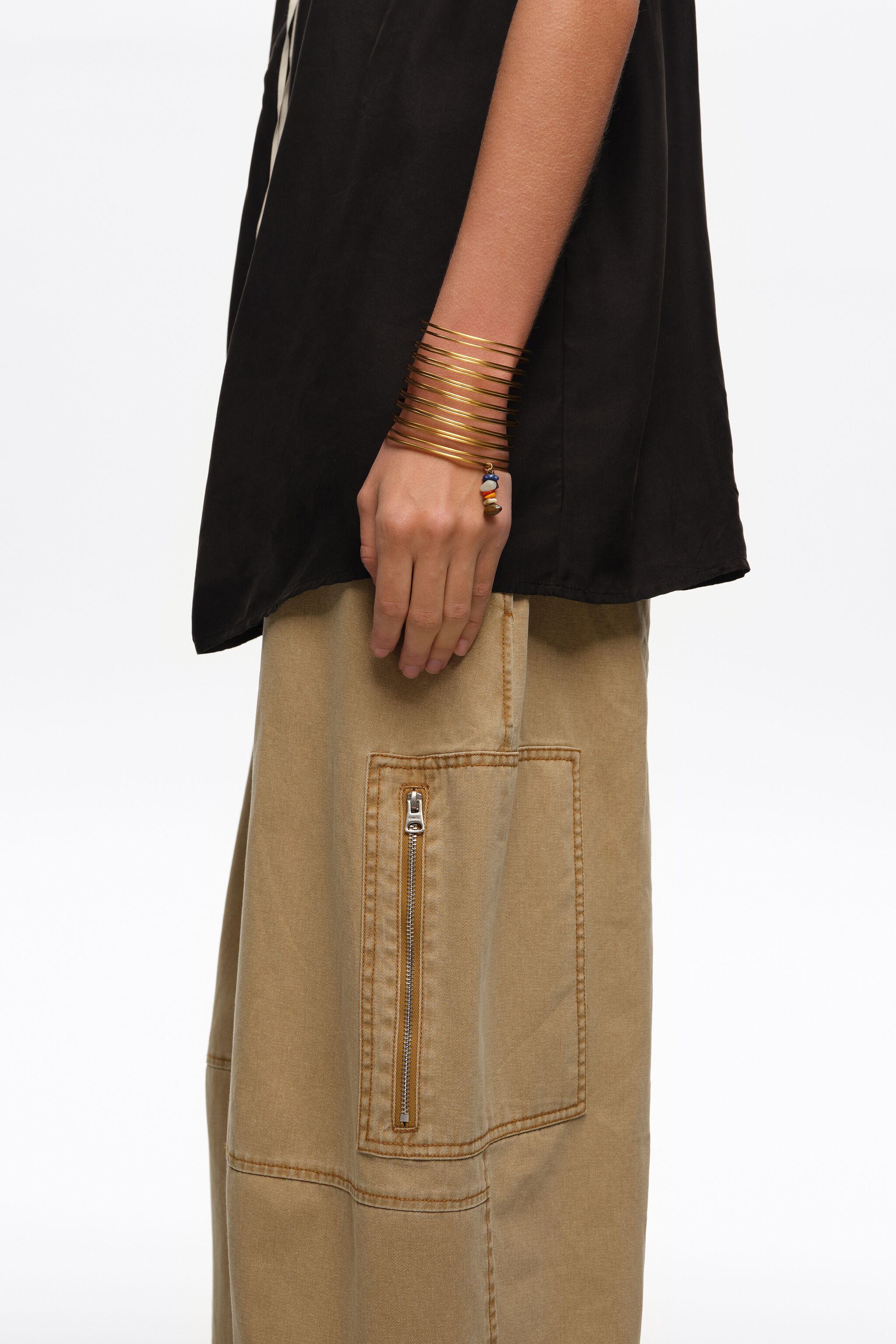 Forearm bracelet with bands in aged gold texture