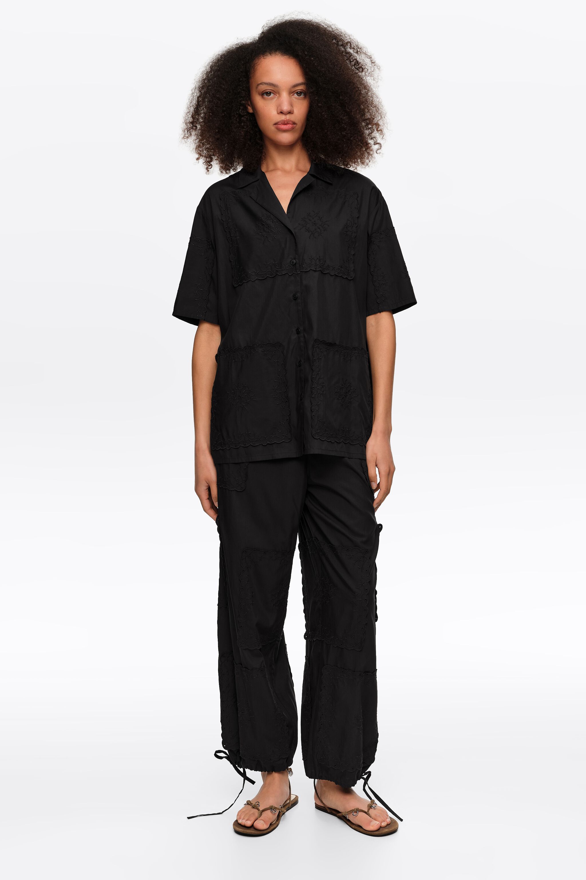 Black scarf-embroidered patchwork trousers