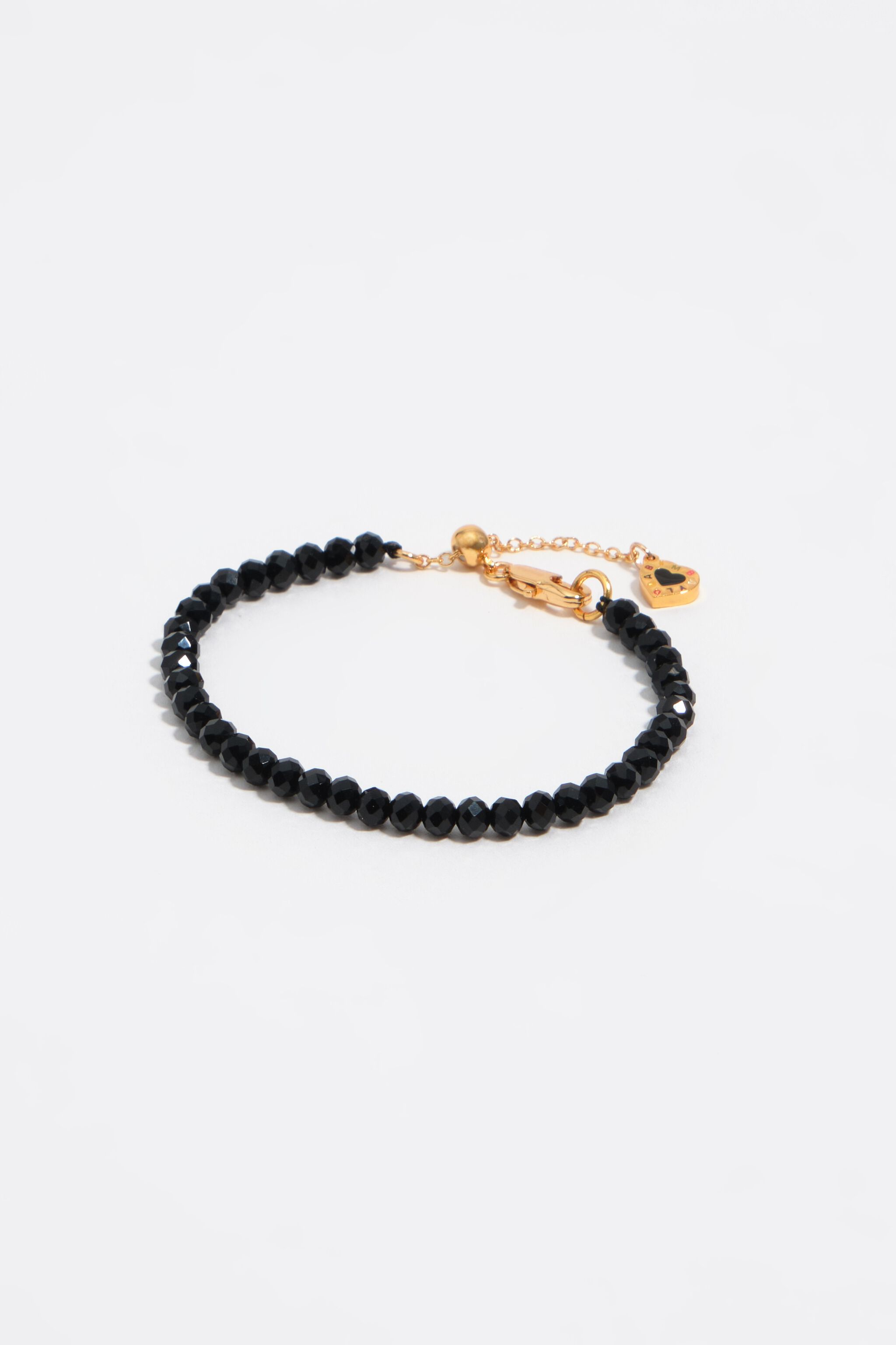 Crystal bracelet with black heart logo