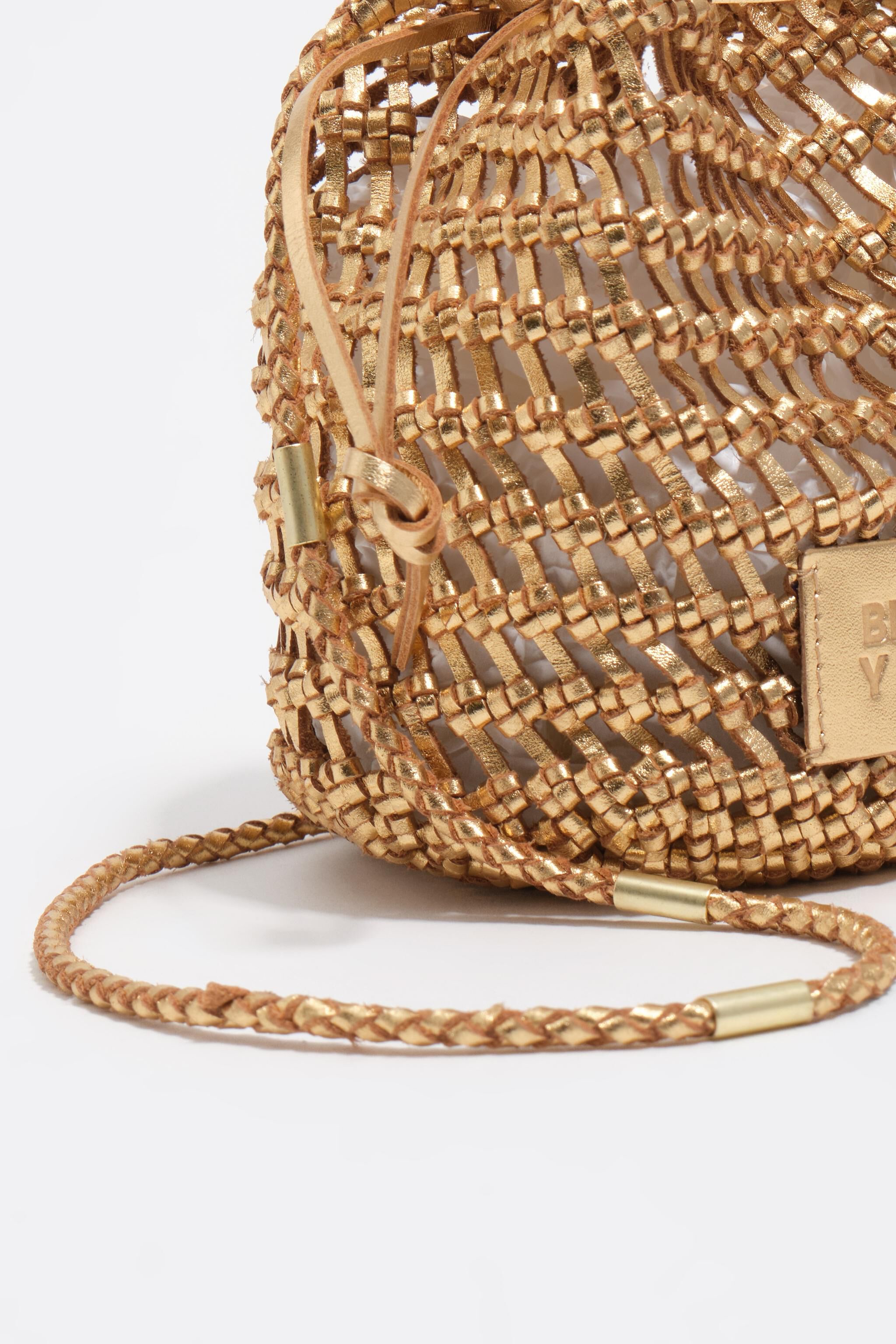 Gold plaited leather mini bucket bag
