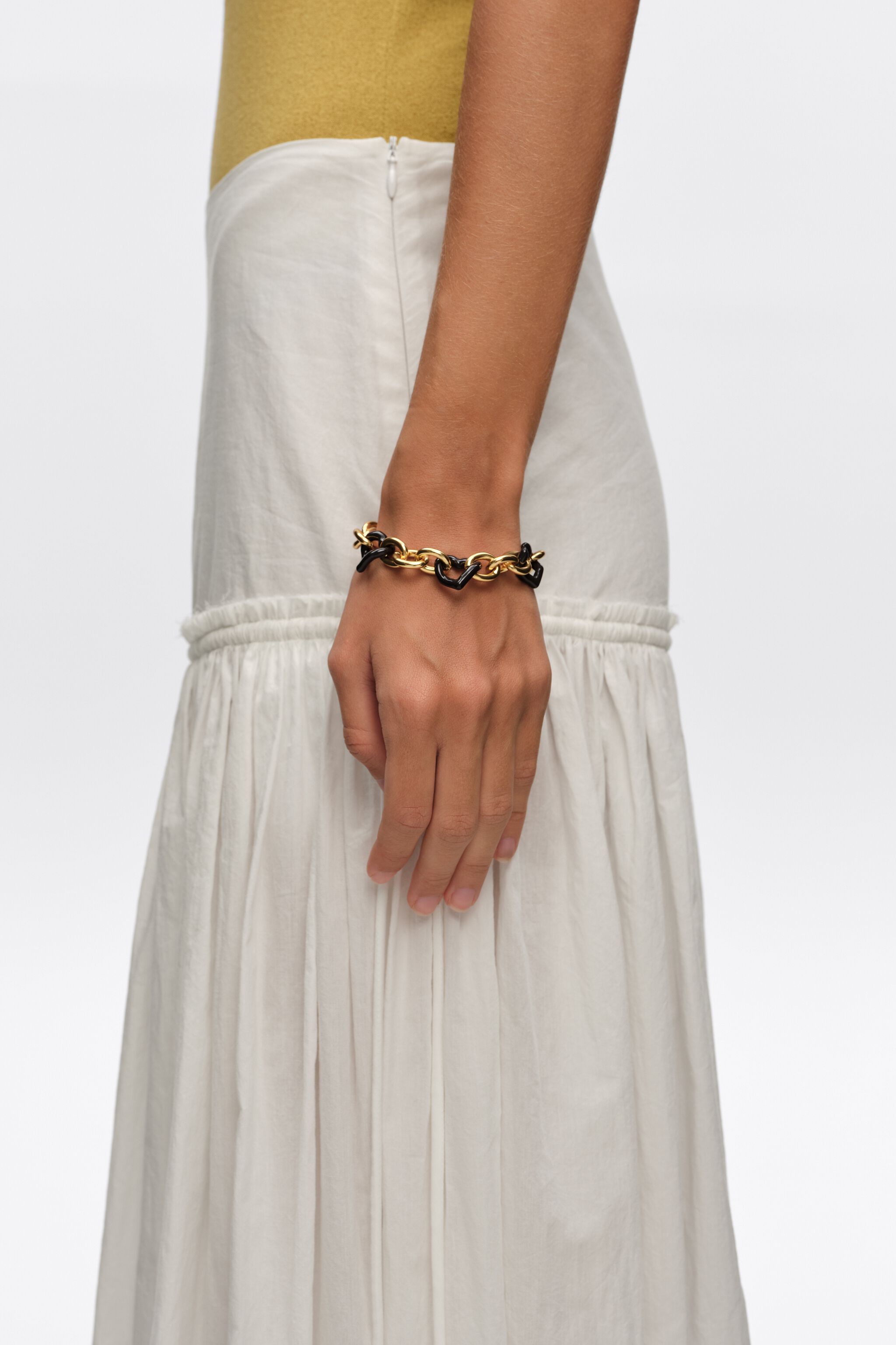 Heart bracelet with gold texture and brown enamel