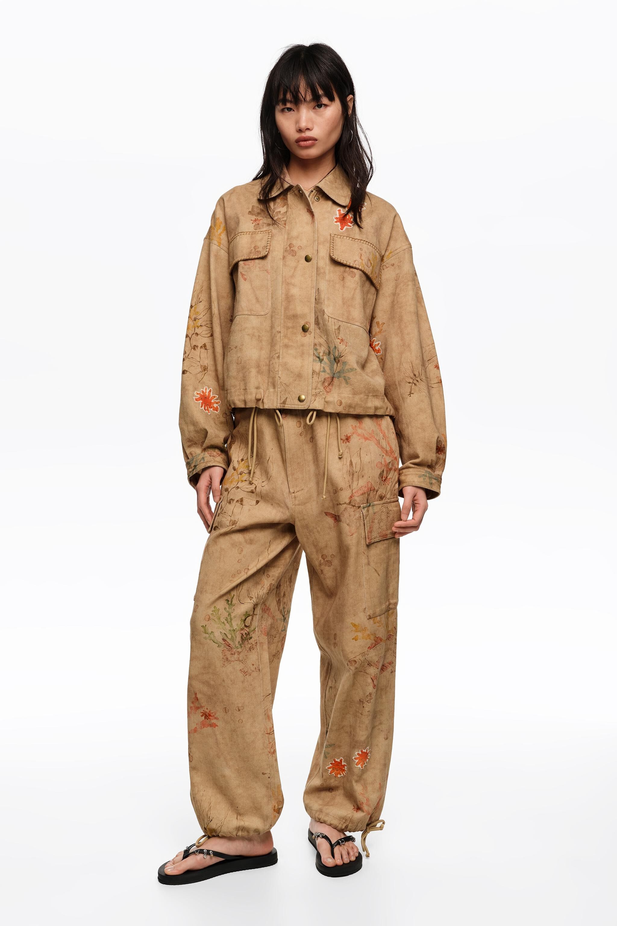 Underwater cropped jacket with stitching and patches