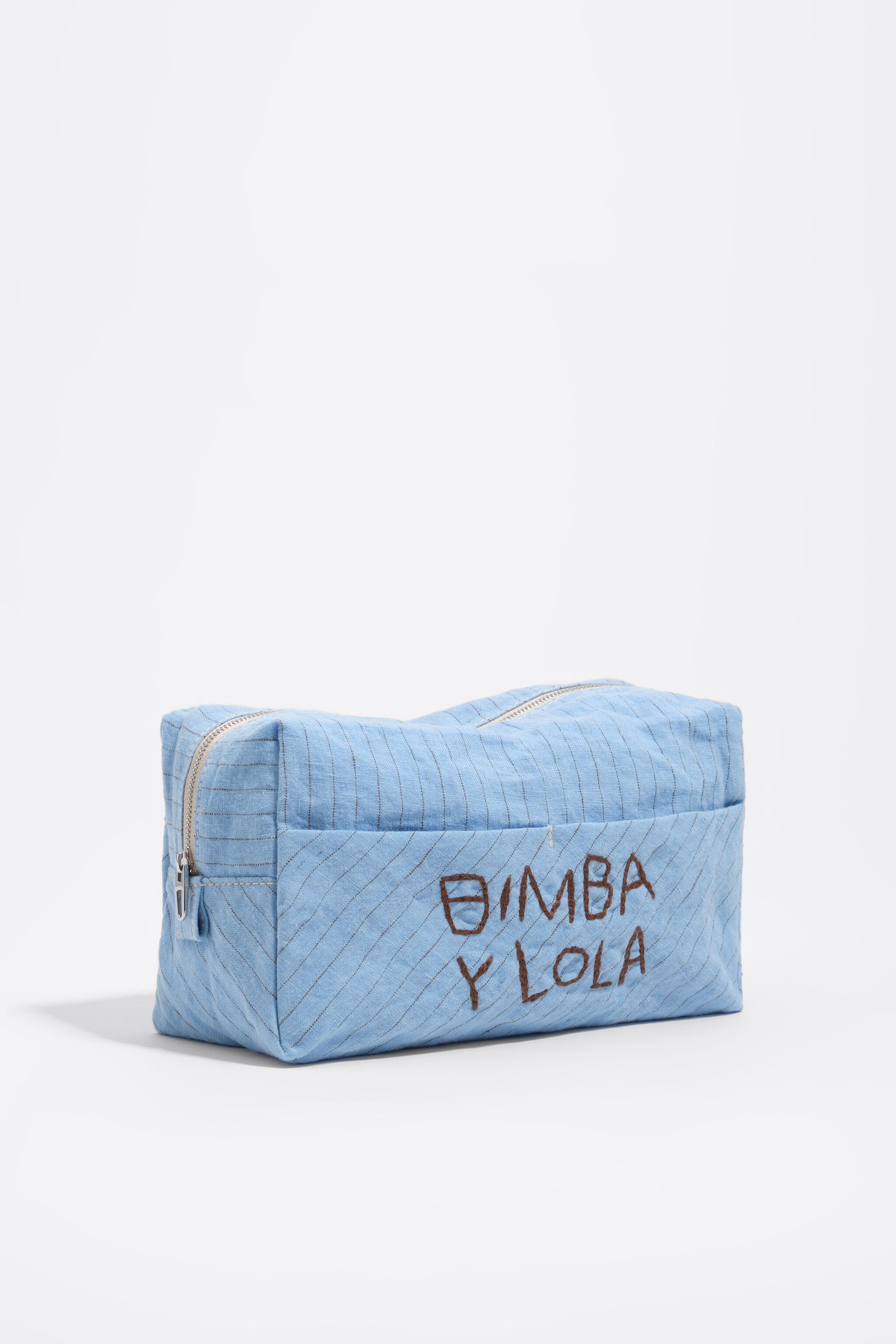 Large light blue linen make-up case