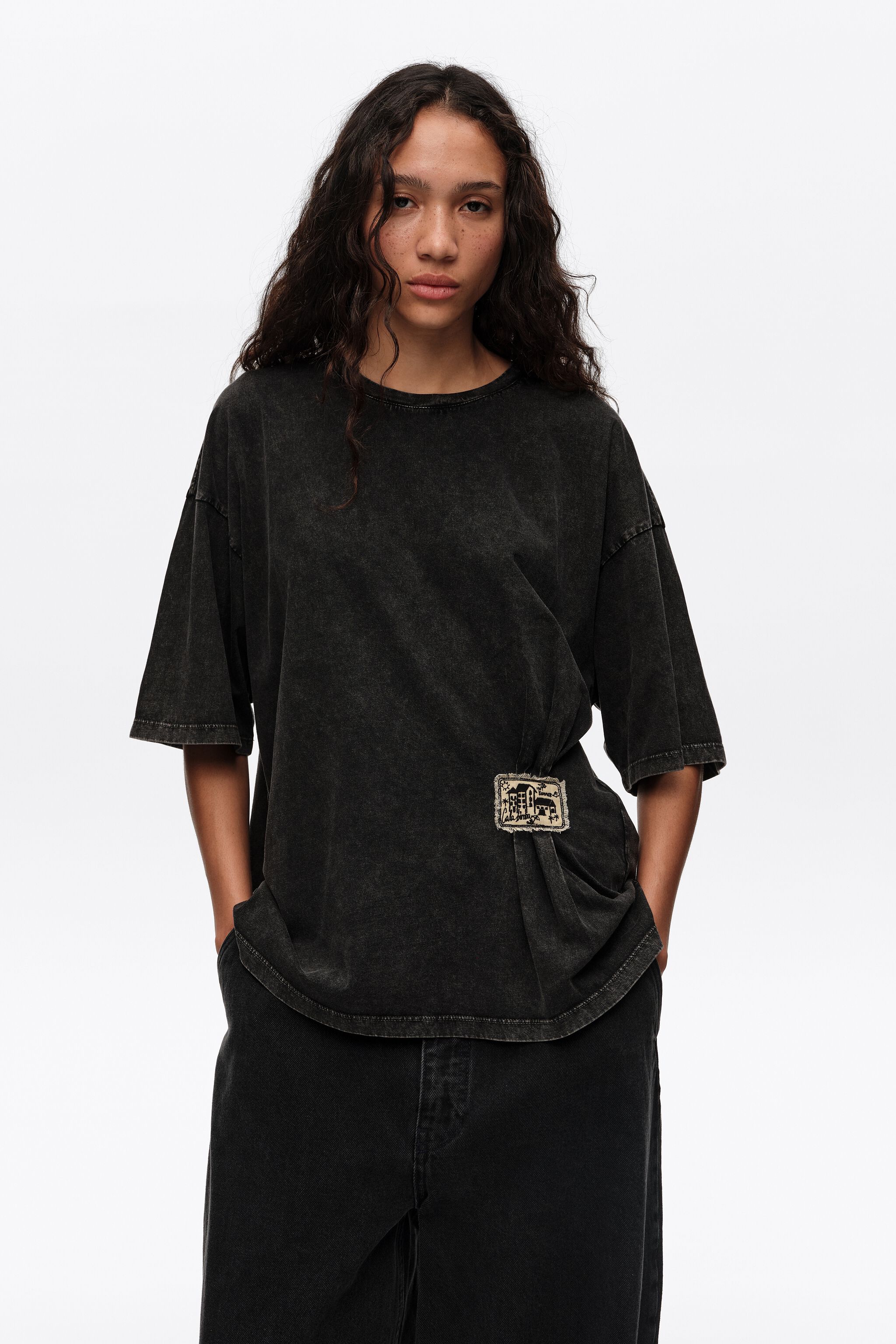 Faded black ruched T-shirt with custom label