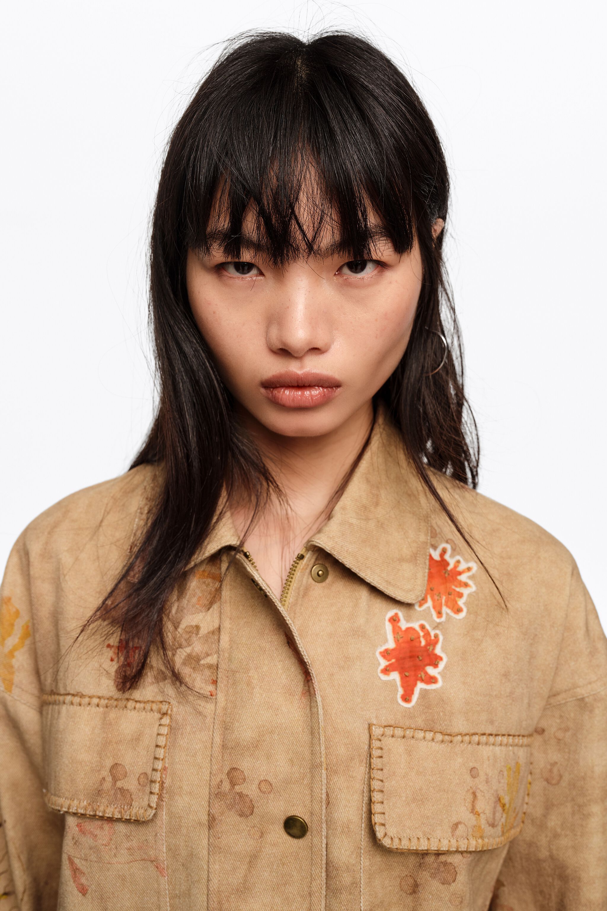Underwater cropped jacket with stitching and patches